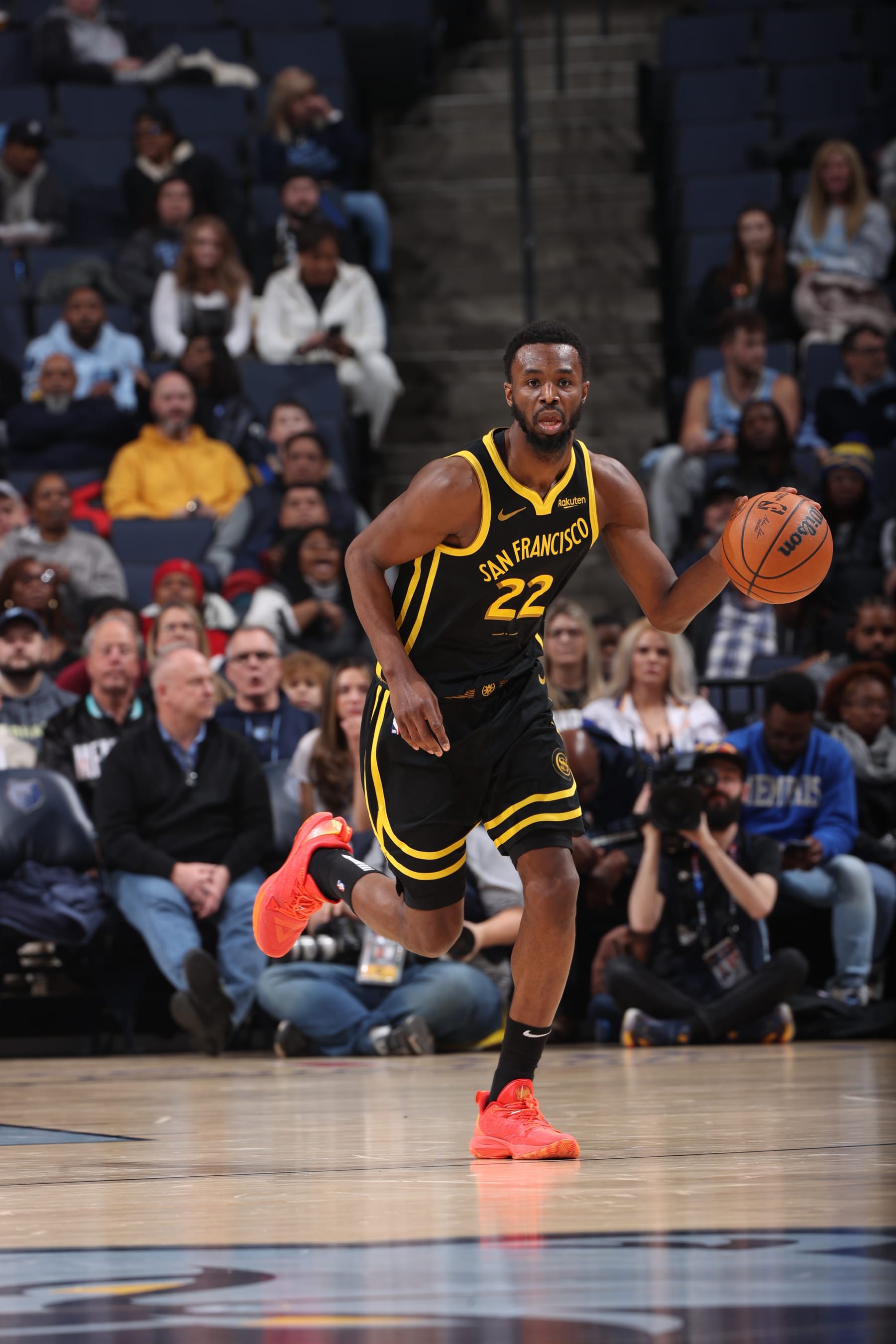 MEMPHIS, TN - JANUARY 15:  Andrew Wiggins #22 of the Golden State Warriors handles the ball during the game  on January 15, 2024 at FedExForum in Memphis, Tennessee. NOTE TO USER: User expressly acknowledges and agrees that, by downloading and or using this photograph, User is consenting to the terms and conditions of the Getty Images License Agreement. Mandatory Copyright Notice: Copyright 2024 NBAE (Photo by Joe Murphy/NBAE via Getty Images)