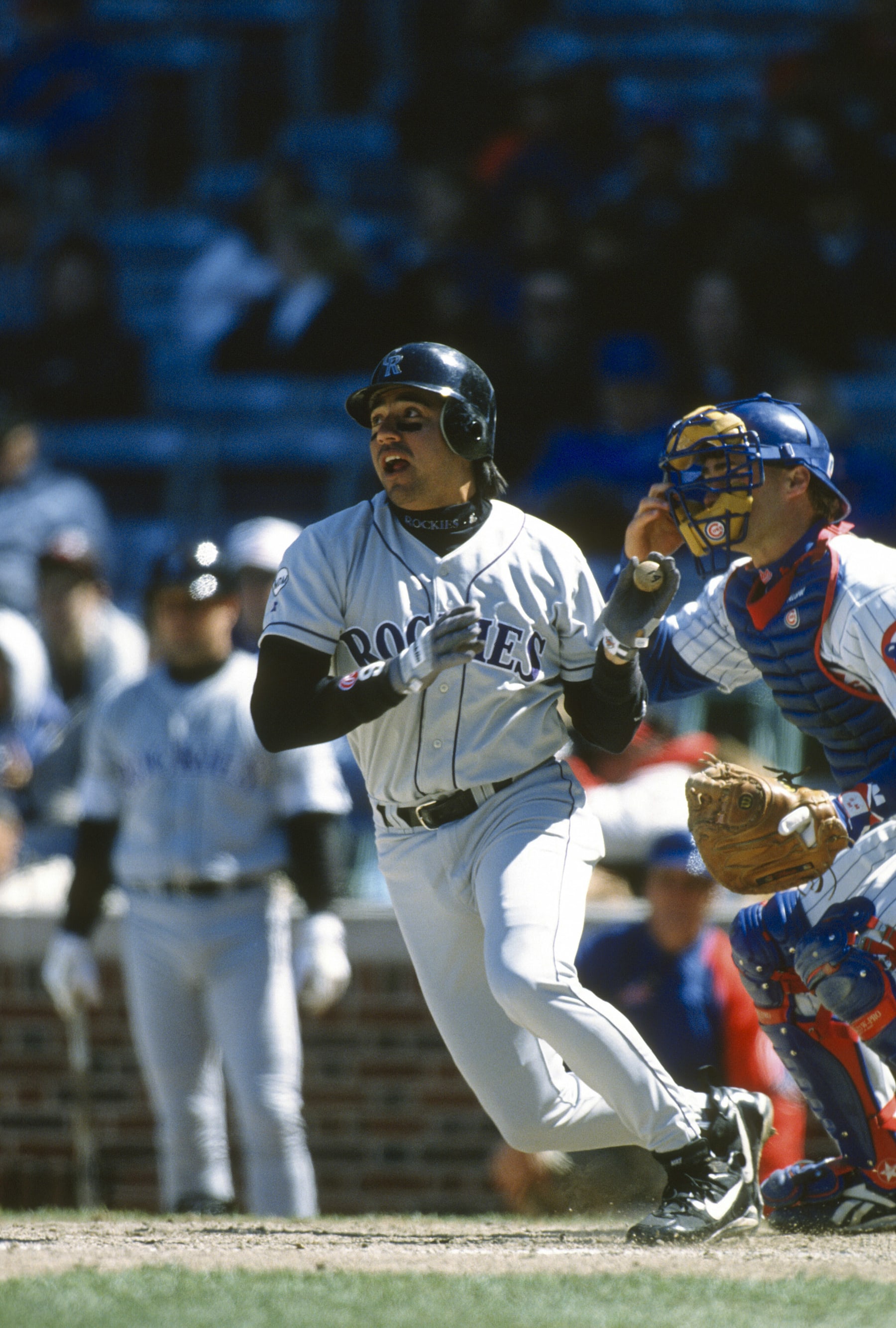 CHICAGO, IL - CIRCA 1996: Vinny Castilla #9 of the Colorado Rockies bats against the Chicago Cubs during an Major League Baseball game circa 1996 at Wrigley Field in Chicago, Illinois. Castilla played for the Rockies from 1993-99 and in 2004 and 2006.  (Photo by Focus on Sport/Getty Images)