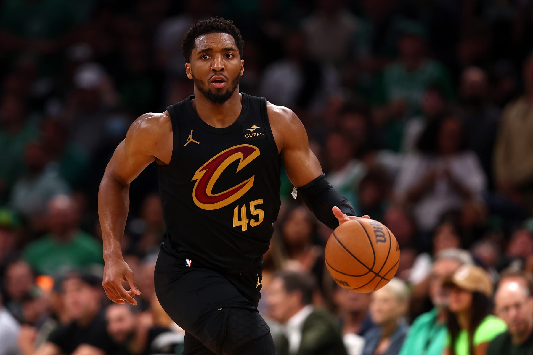 BOSTON, MASSACHUSETTS - MAY 07: Donovan Mitchell #45 of the Cleveland Cavaliers dribbles against the Boston Celtics during Game One of the Eastern Conference Second Round Playoffs against the Cleveland Cavaliers at TD Garden on May 07, 2024 in Boston, Massachusetts. (NOTE TO USER: User expressly acknowledges and agrees that, by downloading and or using this photograph, User is consenting to the terms and conditions of the Getty Images License Agreement.  (Photo by Maddie Meyer/Getty Images)