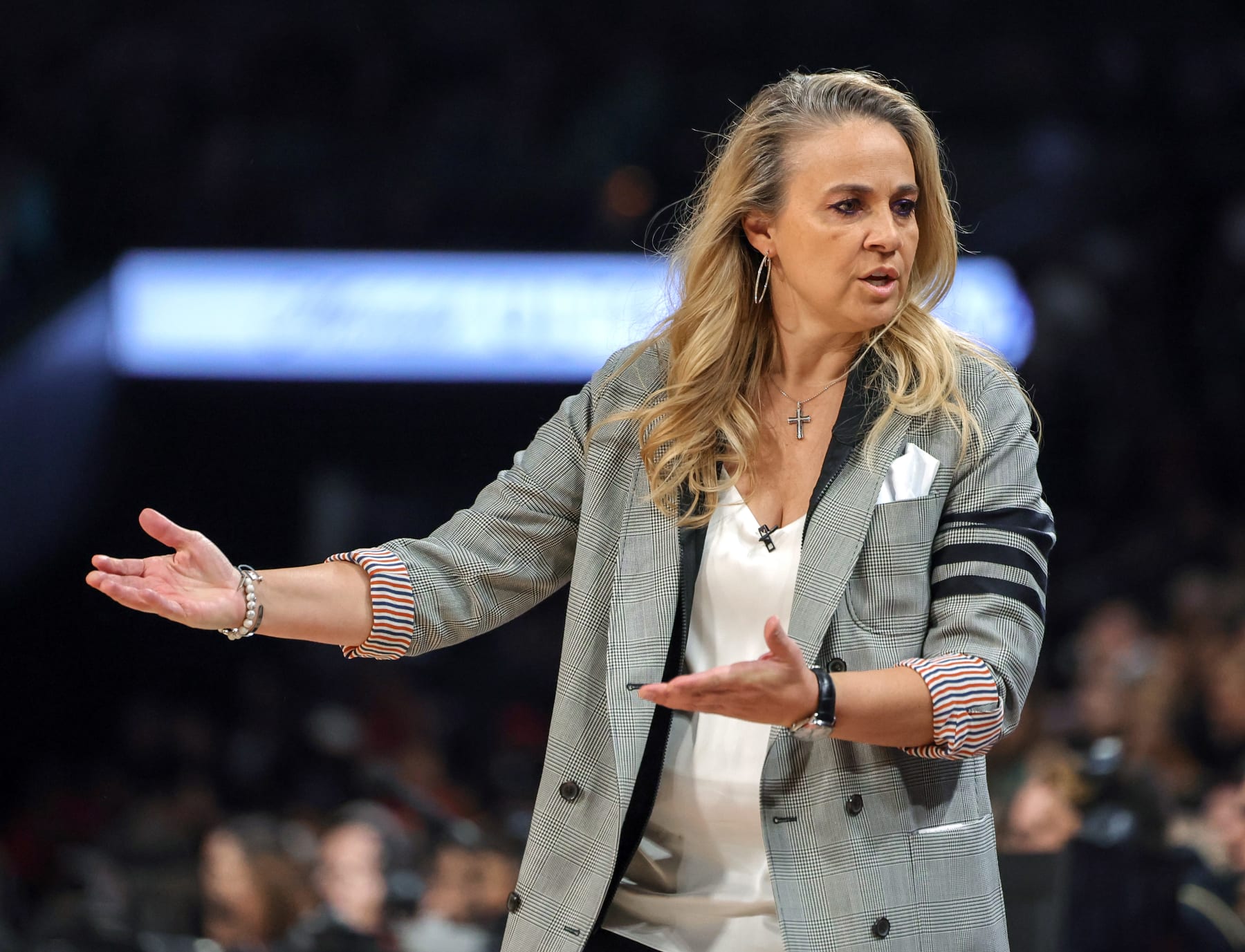 LAS VEGAS, NEVADA - OCTOBER 08: Head coach Becky Hammon of the Las Vegas Aces reacts in the first quarter of Game One of the 2023 WNBA Playoffs finals against the New York Liberty at Michelob ULTRA Arena on October 08, 2023 in Las Vegas, Nevada. The Aces defeated the Liberty 99-82. NOTE TO USER: User expressly acknowledges and agrees that, by downloading and or using this photograph, User is consenting to the terms and conditions of the Getty Images License Agreement. (Photo by Ethan Miller/Getty Images)