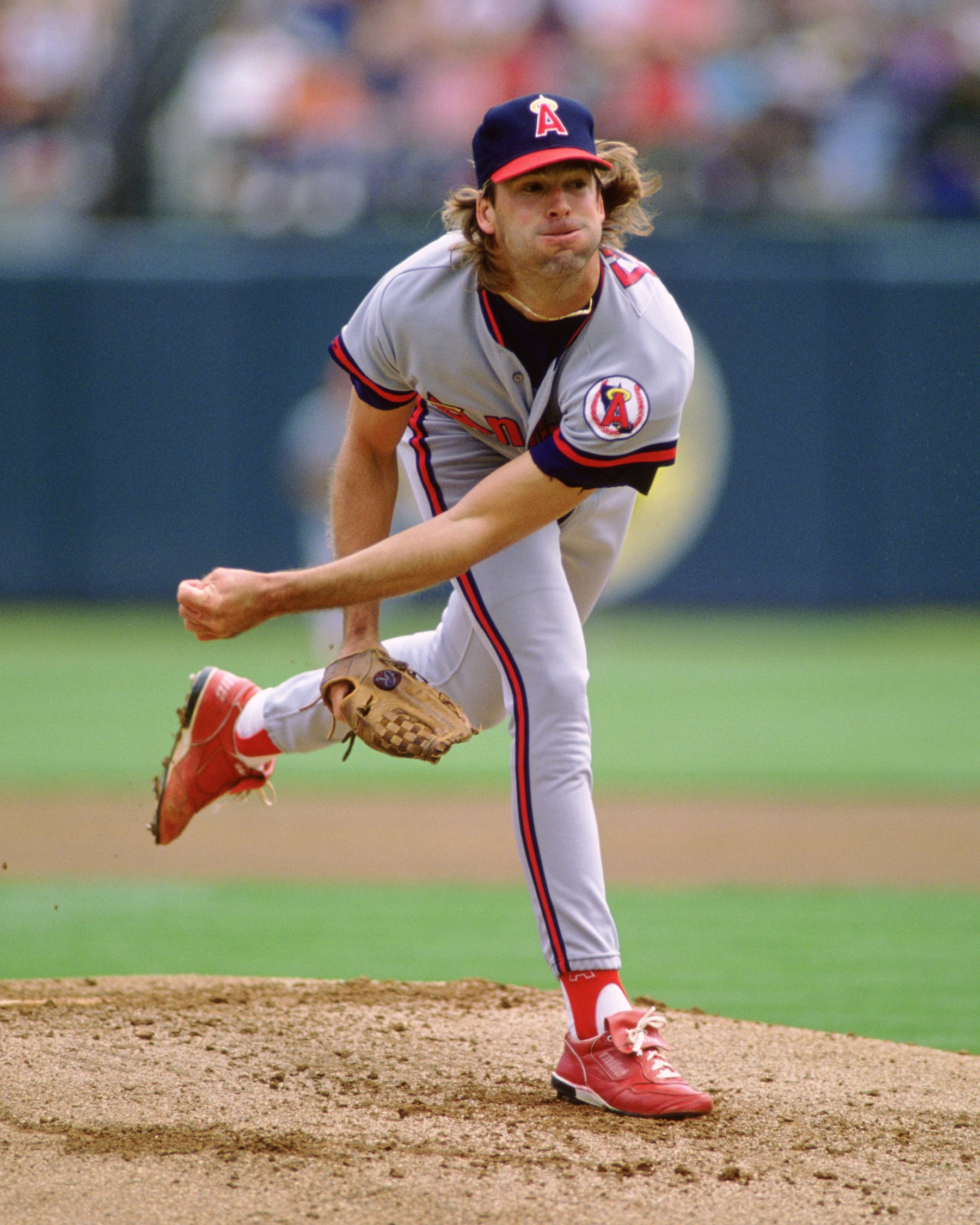 OAKLAND - 1990: Chuck Finley of the California Angels pitches during an MLB game against the Oakland Athletics at the Oakland Coliseum during the 1990 season. (Photo by Ron Vesely/MLB Photos via Getty Images) 
