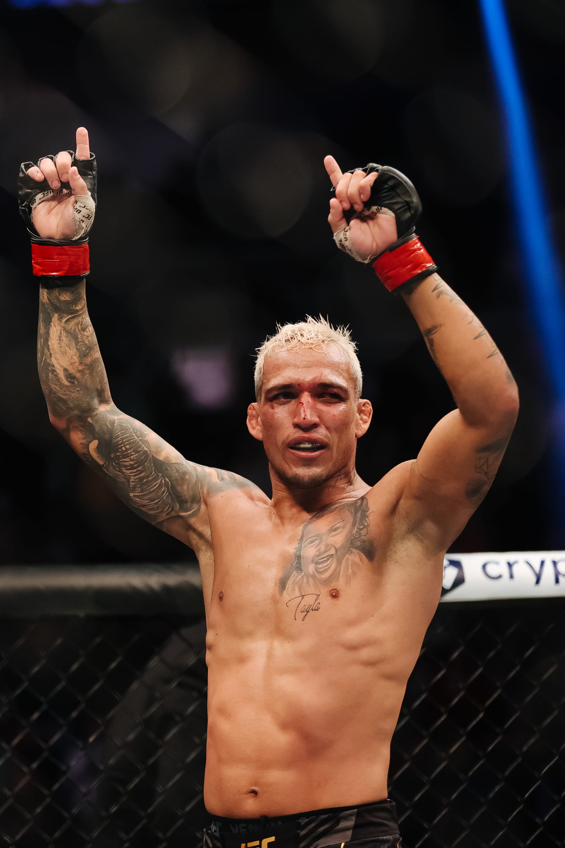 LAS VEGAS, NEVADA - DECEMBER 11: Charles Oliveira of Brazil reacts following his lightweight title fight against Dustin Poirier during the UFC 269 event at T-Mobile Arena on December 11, 2021 in Las Vegas, Nevada. (Photo by Carmen Mandato/Getty Images)