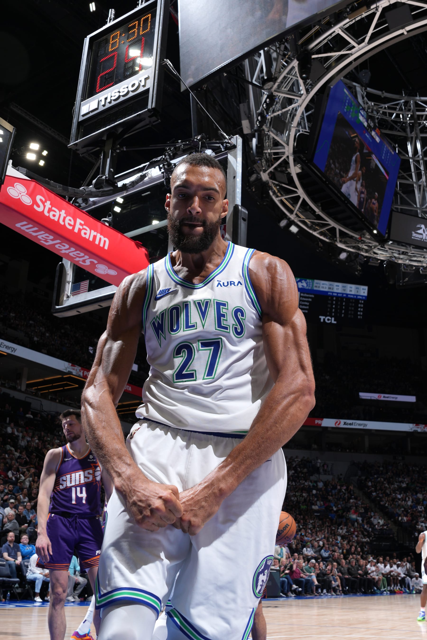 MINNEAPOLIS, MN -  APRIL 14: Rudy Gobert #27 of the Minnesota Timberwolves celebrates during the game against the Phoenix Suns on April 14, 2024 at Target Center in Minneapolis, Minnesota. NOTE TO USER: User expressly acknowledges and agrees that, by downloading and or using this Photograph, user is consenting to the terms and conditions of the Getty Images License Agreement. Mandatory Copyright Notice: Copyright 2024 NBAE (Photo by Jordan Johnson/NBAE via Getty Images)