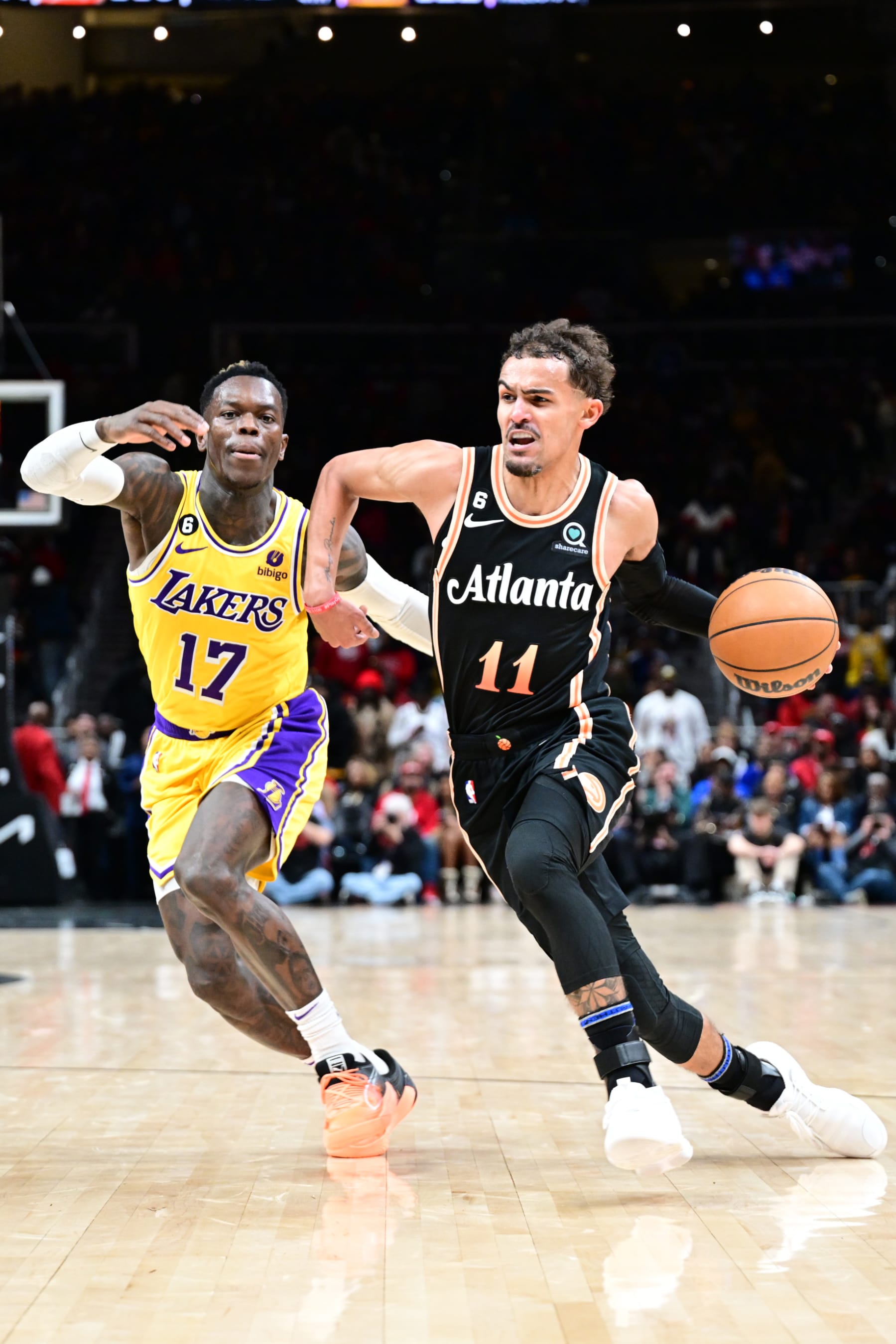 ATLANTA, GA - DECEMBER 30: Trae Young #11 of the Atlanta Hawks drives to the basket during the game against the Los Angeles Lakers on December 1, 2022 at State Farm Arena in Atlanta, Georgia.  NOTE TO USER: User expressly acknowledges and agrees that, by downloading and/or using this Photograph, user is consenting to the terms and conditions of the Getty Images License Agreement. Mandatory Copyright Notice: Copyright 2022 NBAE (Photo by Adam Hagy/NBAE via Getty Images)