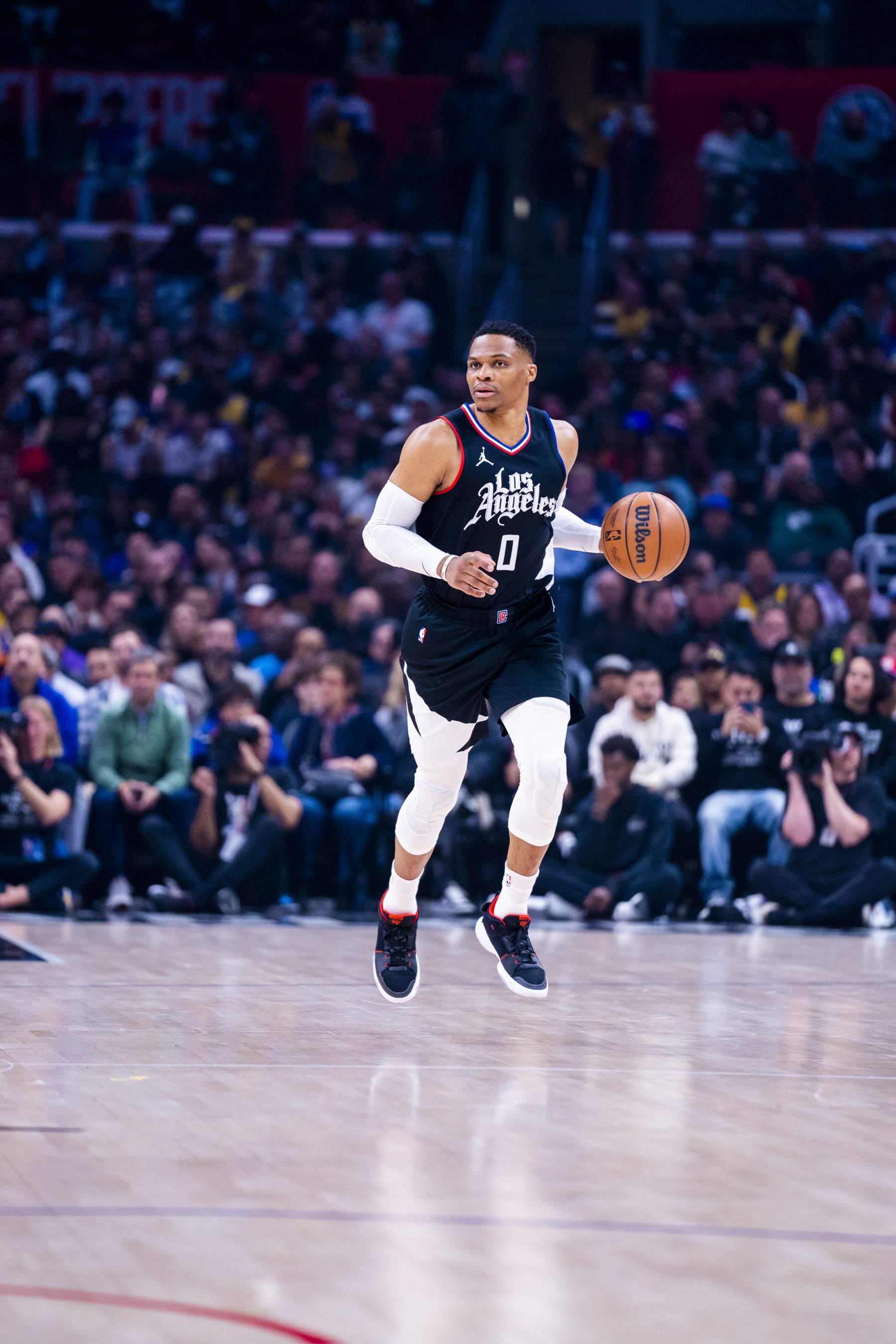 LOS ANGELES, CA - FEBRUARY 28:  Russell Westbrook #0 of the LA Clippers handles the ball during the game  on February 28, 2024 at Crypto.Com Arena in Los Angeles, California. NOTE TO USER: User expressly acknowledges and agrees that, by downloading and/or using this Photograph, user is consenting to the terms and conditions of the Getty Images License Agreement. Mandatory Copyright Notice: Copyright 2024 NBAE (Photo by Tyler Ross/NBAE via Getty Images)