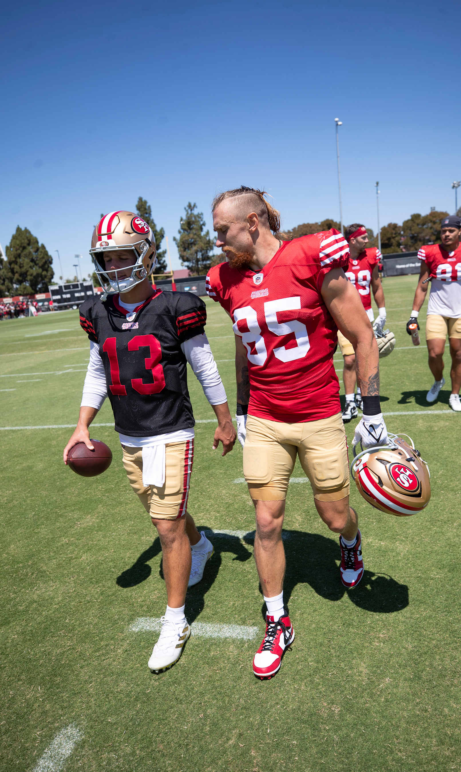SANTA CLARA, CA - JULY 31: Brock Purdy #13 and George Kittle #85 of the San Francisco 49ers during training camp at SAP Performance Facility on July 31, 2024 in Santa Clara, California. (Photo by Michael Zagaris/San Francisco 49ers/Getty Images)