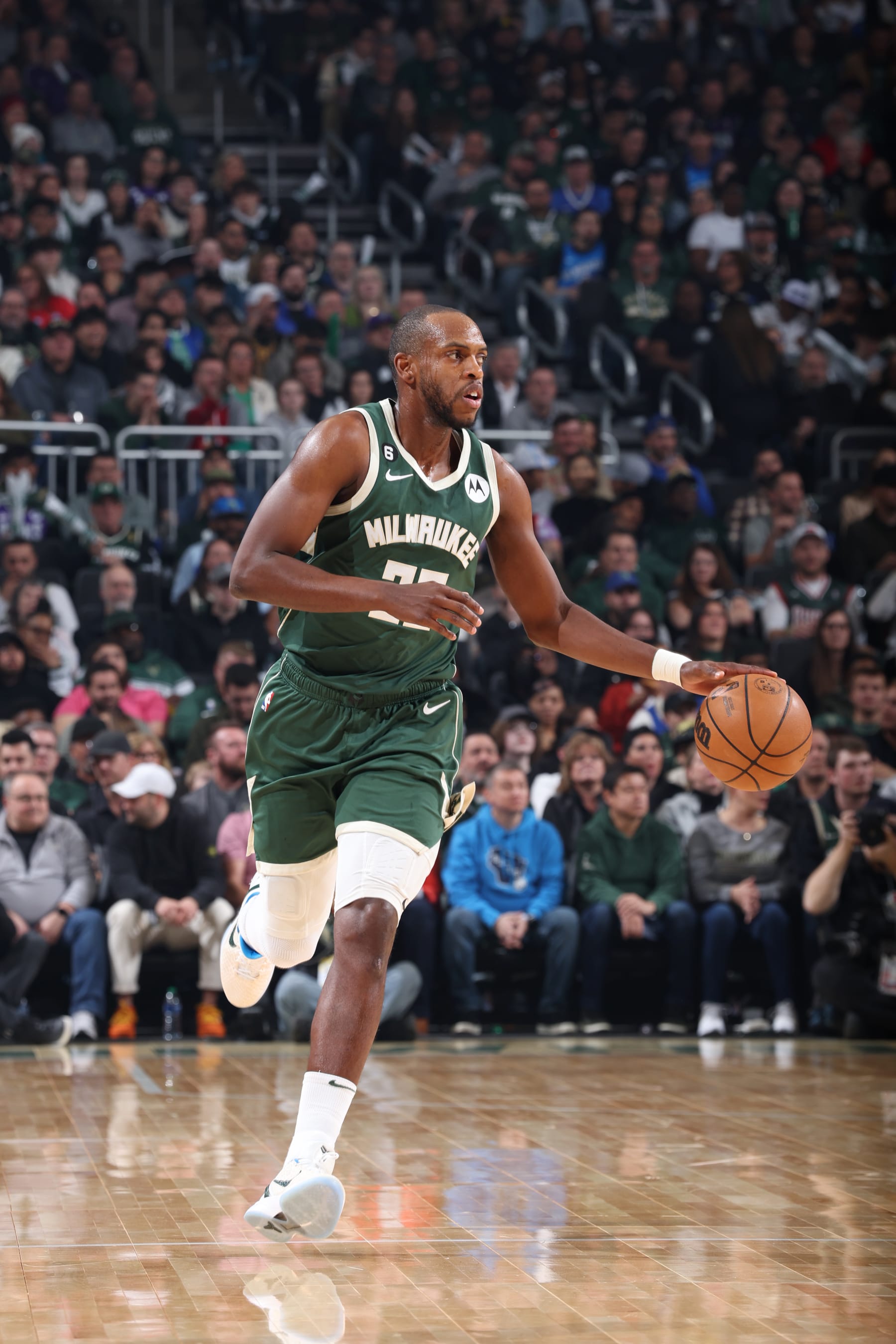 MILWAUKEE, WI - APRIL 26: Khris Middleton #22 of the Milwaukee Bucks dribbles the ball against the Miami Heat during Round 1 Game 5 of the 2023 NBA Playoffs on April 26, 2023 at the Fiserv Forum Center in Milwaukee, Wisconsin. NOTE TO USER: User expressly acknowledges and agrees that, by downloading and or using this Photograph, user is consenting to the terms and conditions of the Getty Images License Agreement. Mandatory Copyright Notice: Copyright 2023 NBAE (Photo by Jeff Haynes/NBAE via Getty Images).