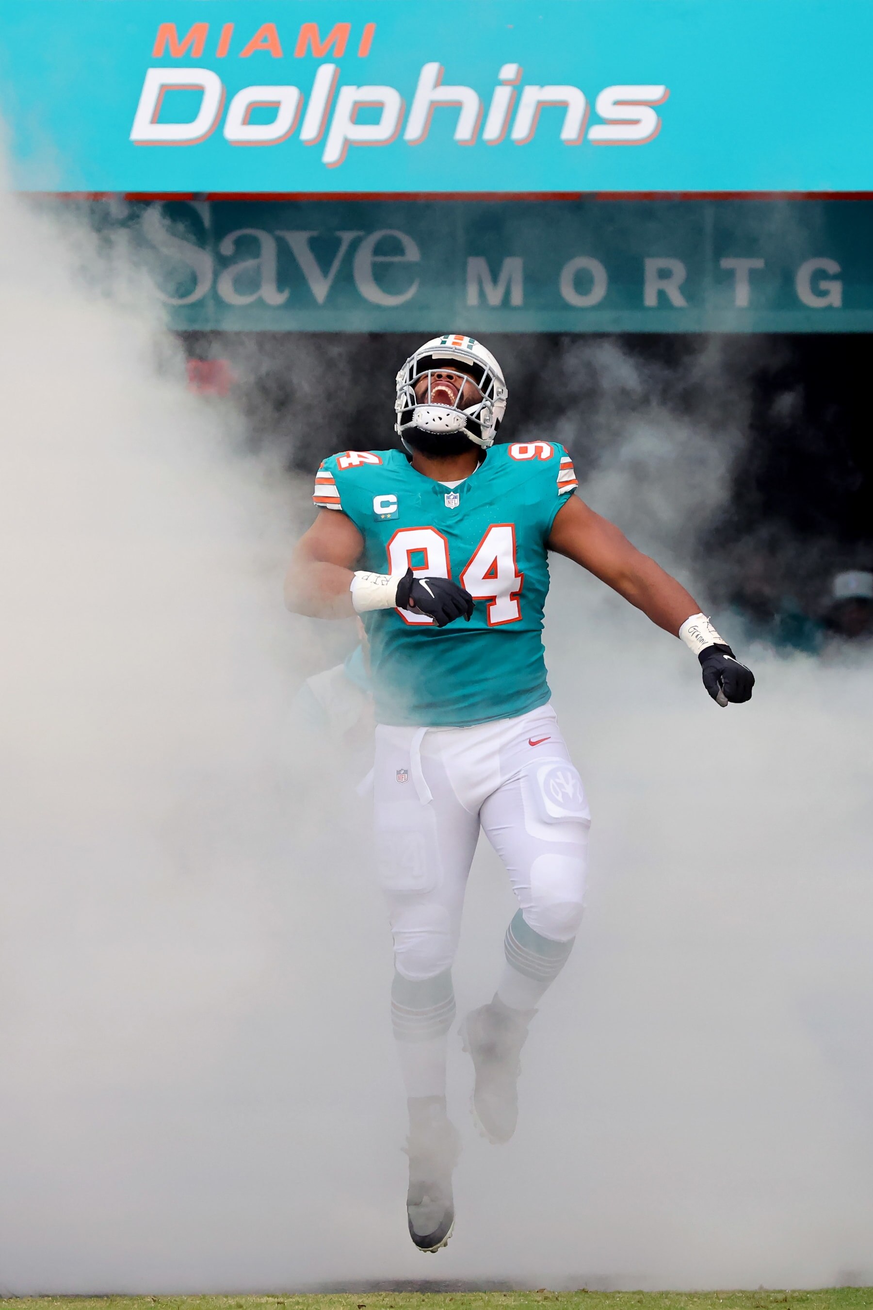 MIAMI GARDENS, FLORIDA - DECEMBER 24: Christian Wilkins #94 of the Miami Dolphins takes the field during player introductions prior to the game against the Dallas Cowboys at Hard Rock Stadium on December 24, 2023 in Miami Gardens, Florida. (Photo by Stacy Revere/Getty Images) MIAMI GARDENS, FLORIDA - DECEMBER 24: Christian Wilkins #94 of the Miami Dolphins takes the field during player introductions prior to the game against the Dallas Cowboys at Hard Rock Stadium on December 24, 2023 in Miami Gardens, Florida. (Photo by Stacy Revere/Getty Images)