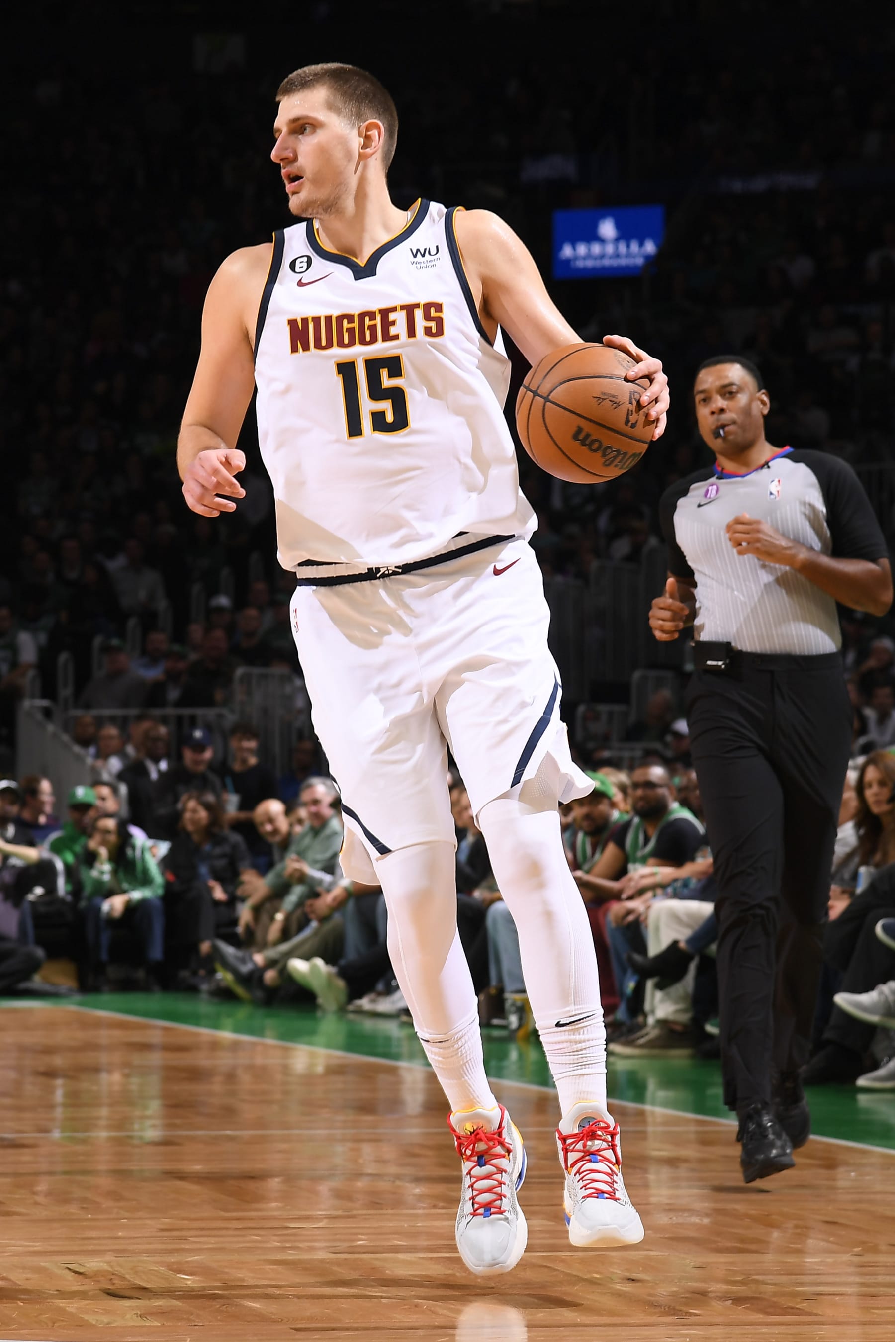 BOSTON, MA - NOVEMBER 11: Nikola Jokic #15 of the Denver Nuggets dribbles the ball during the game against the Boston Celtics on November 1, 2022 at the TD Garden in Boston, Massachusetts.  NOTE TO USER: User expressly acknowledges and agrees that, by downloading and or using this photograph, User is consenting to the terms and conditions of the Getty Images License Agreement. Mandatory Copyright Notice: Copyright 2022 NBAE  (Photo by Brian Babineau/NBAE via Getty Images)