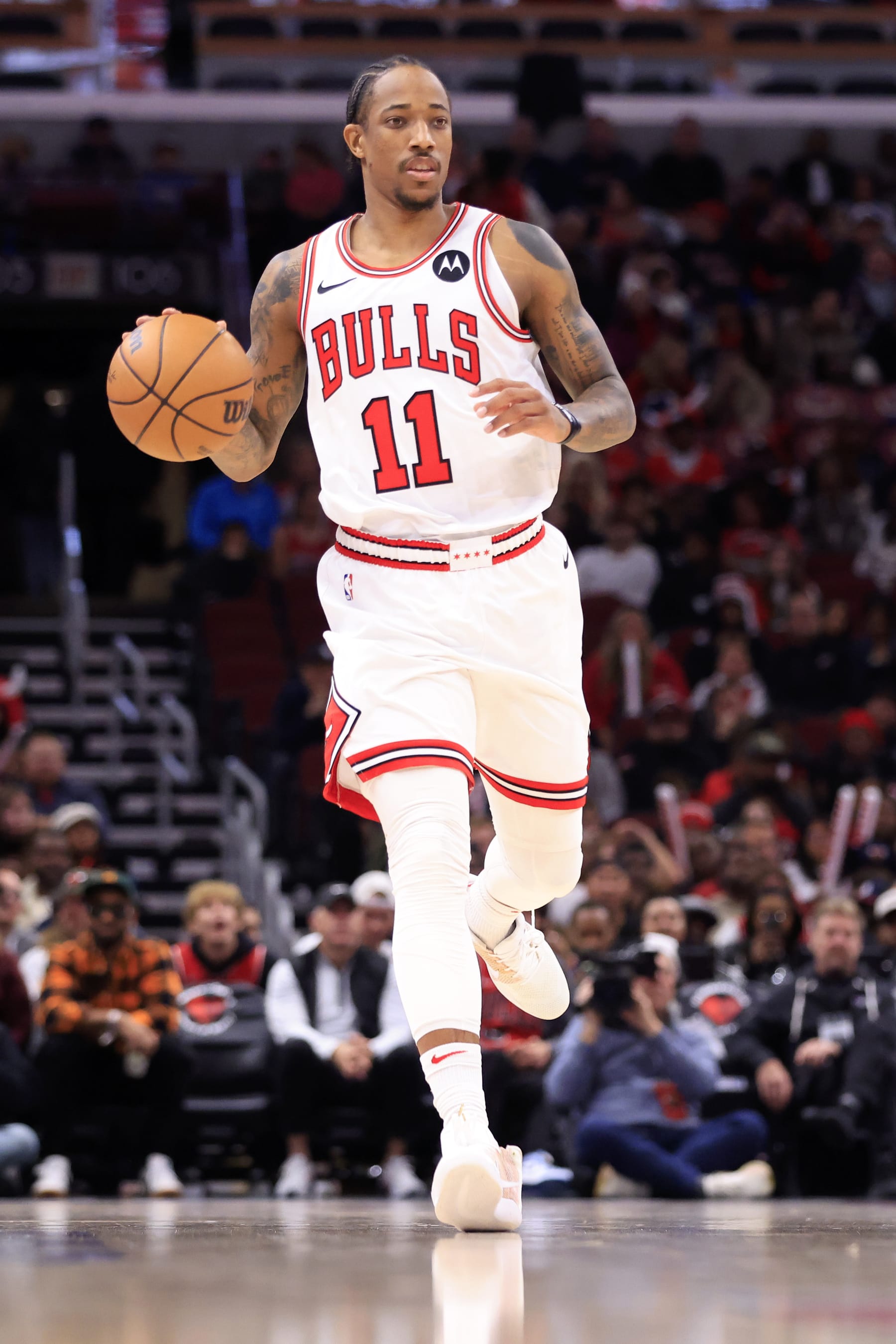CHICAGO, ILLINOIS - NOVEMBER 20: DeMar DeRozan #11 of the Chicago Bulls brings the ball up the court during the second half against the Miami Heat at the United Center on November 20, 2023 in Chicago, Illinois. NOTE TO USER: User expressly acknowledges and agrees that, by downloading and or using this photograph, User is consenting to the terms and conditions of the Getty Images License Agreement. (Photo by Justin Casterline/Getty Images)