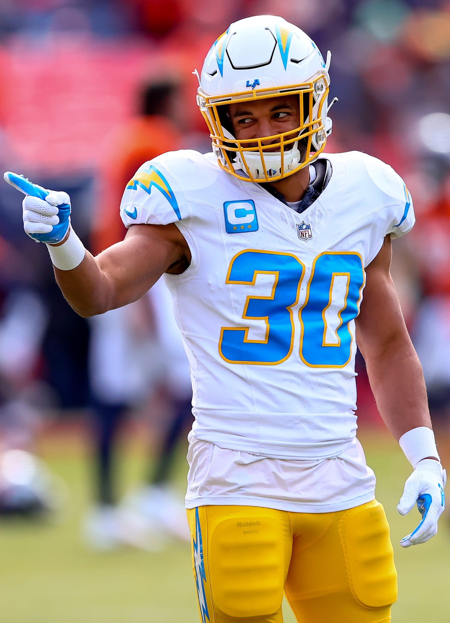 DENVER, CO - DECEMBER 31: Los Angeles Chargers running back Austin Ekeler warms up before an NFL game between the Los Angeles Chargers and the Denver Broncos on December 31, 2023 at Empower Field at Mile High in Denver, CO. (Photo by Steve Nurenberg/Icon Sportswire via Getty Images)