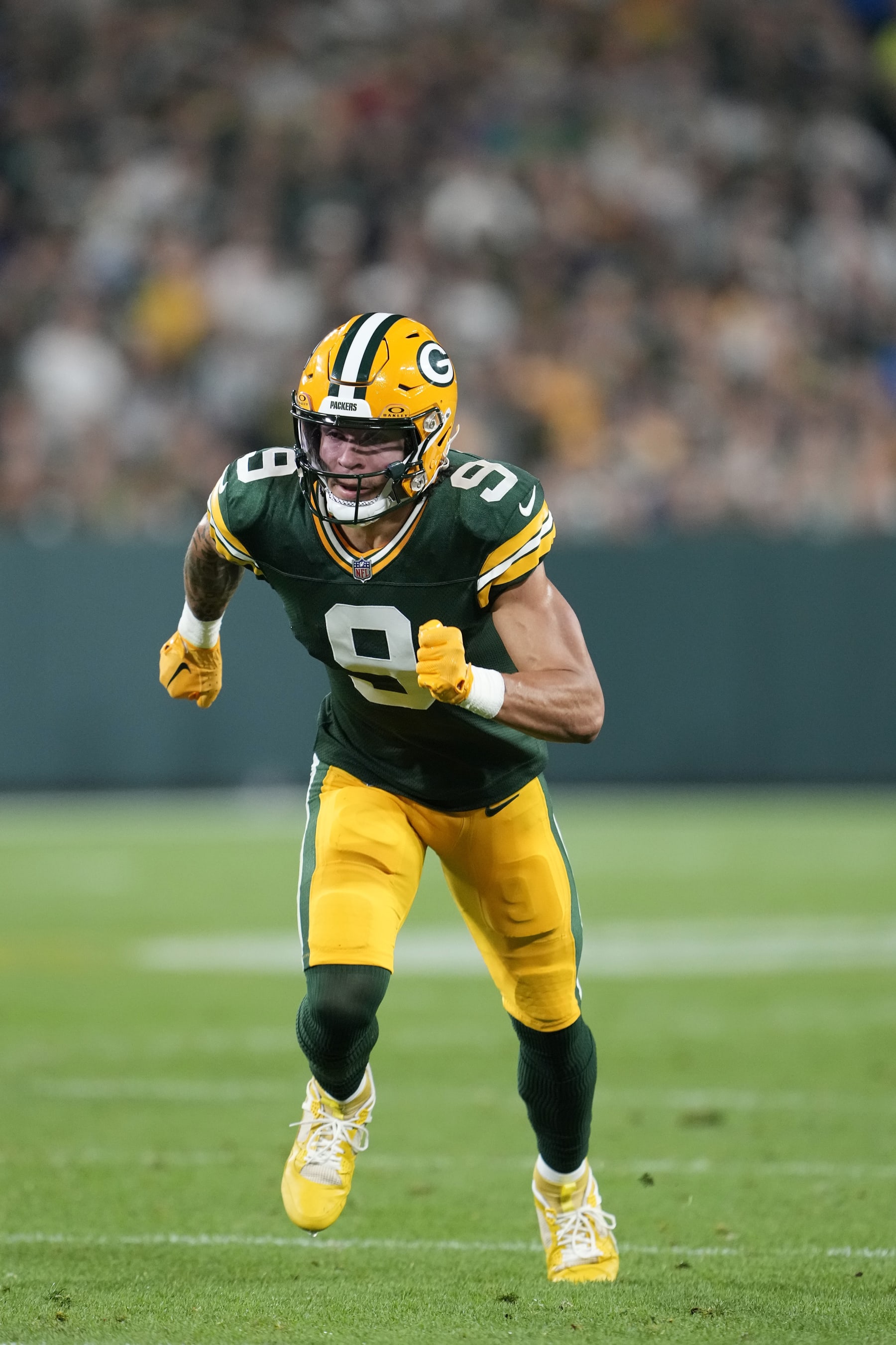 GREEN BAY, WISCONSIN - SEPTEMBER 28: Christian Watson #9 of the Green Bay Packers runs a route against the Detroit Lions during the second half in the game at Lambeau Field on September 28, 2023 in Green Bay, Wisconsin. (Photo by Patrick McDermott/Getty Images)