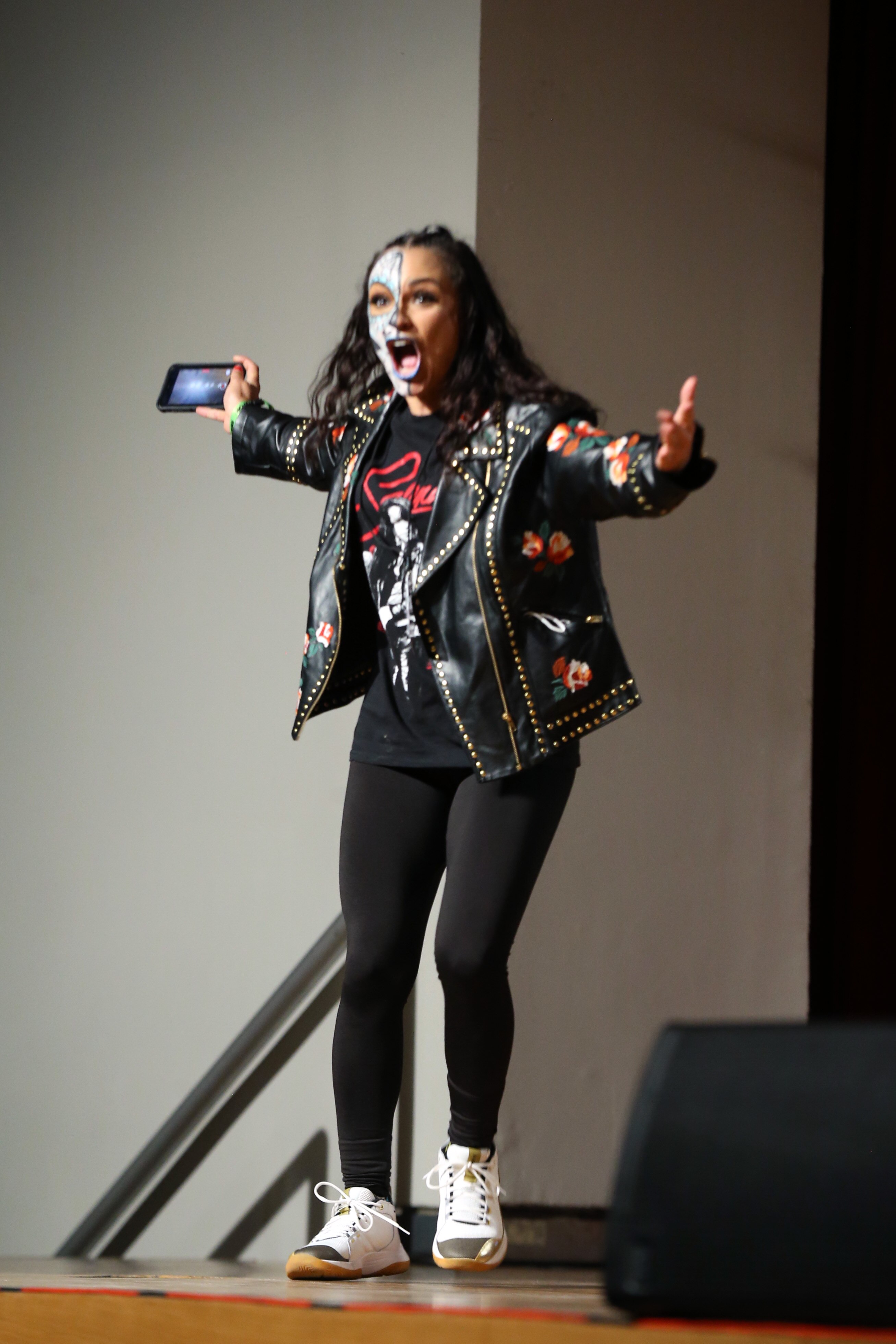 NEW YORK, NEW YORK - OCTOBER 09: Thunder Rosa appears onstage during the All Elite Wrestling Invades New York Comic Con panel during Day 3 of New York Comic Con 2021 at Jacob Javits Center on October 09, 2021 in New York City. (Photo by Bennett Raglin/Getty Images for ReedPop)