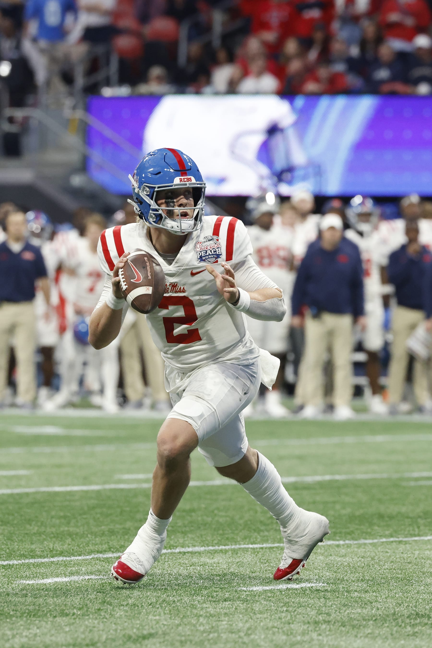 ATLANTA, GA - DECEMBER 30: Mississippi Rebels quarterback Jaxson Dart (2) looks to pass against the Penn State Nittany Lions during the Chick-fil-A Peach Bowl on December 30, 2023 at Mercedes-Benz Stadium in Atlanta, Georgia. (Photo by Joe Robbins/Icon Sportswire via Getty Images)