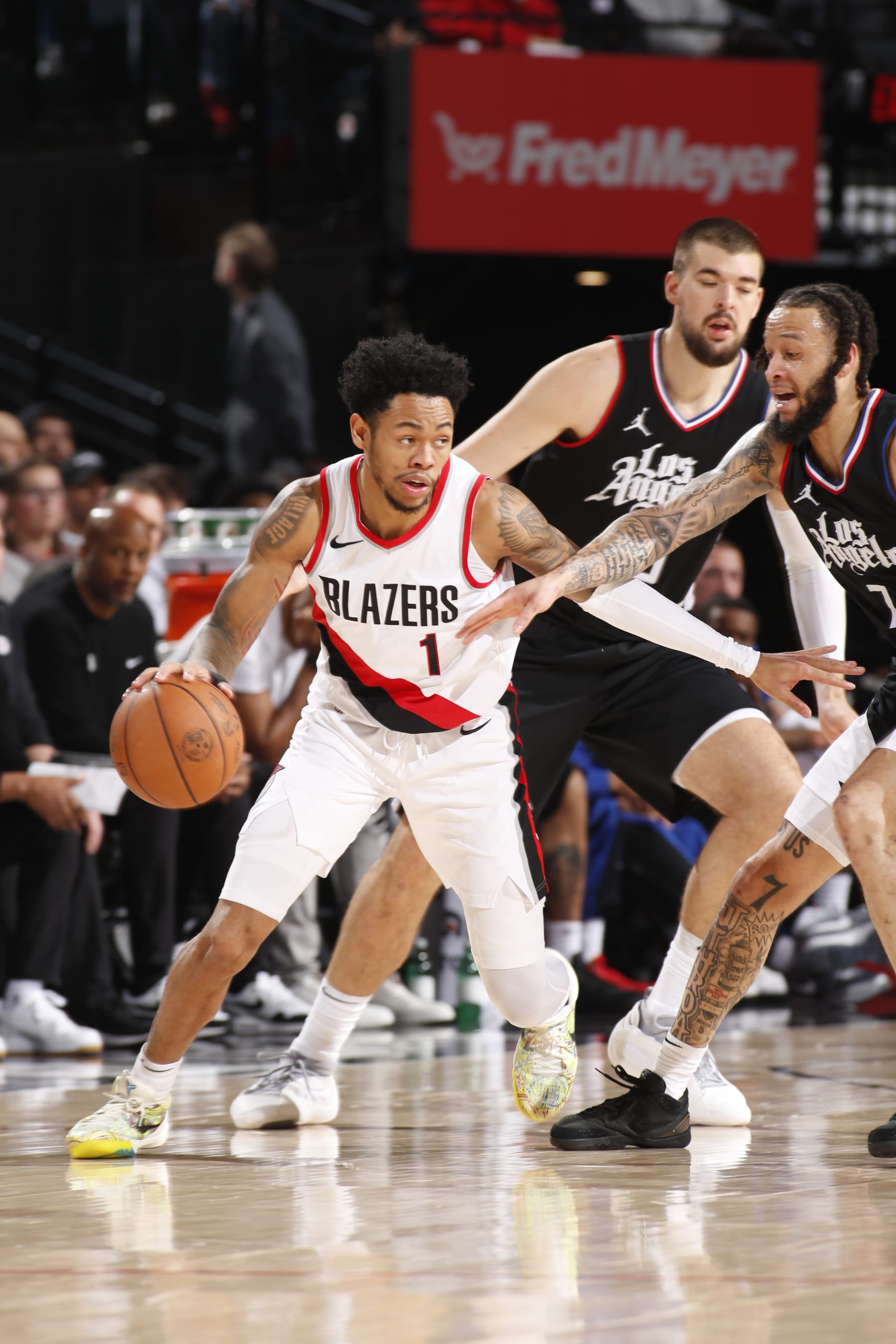 PORTLAND, OR - MARCH 22: Anfernee Simons #1 of the Portland Trail Blazers handles the ball during the game  on March 22, 2024 at the Moda Center Arena in Portland, Oregon. NOTE TO USER: User expressly acknowledges and agrees that, by downloading and or using this photograph, user is consenting to the terms and conditions of the Getty Images License Agreement. Mandatory Copyright Notice: Copyright 2024 NBAE (Photo by Cameron Browne/NBAE via Getty Images)