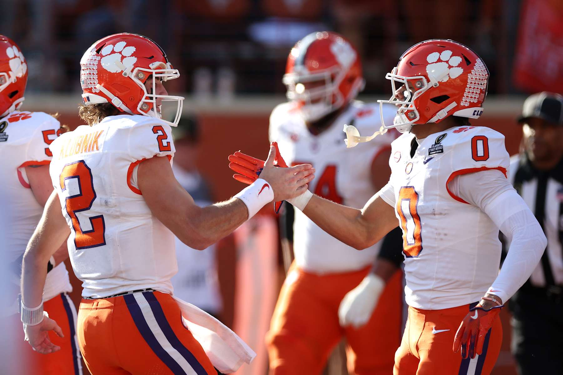 Antonio Williams #0 of the Clemson Tigers celebrates his touchdown catch with Cade Klubnik #2 