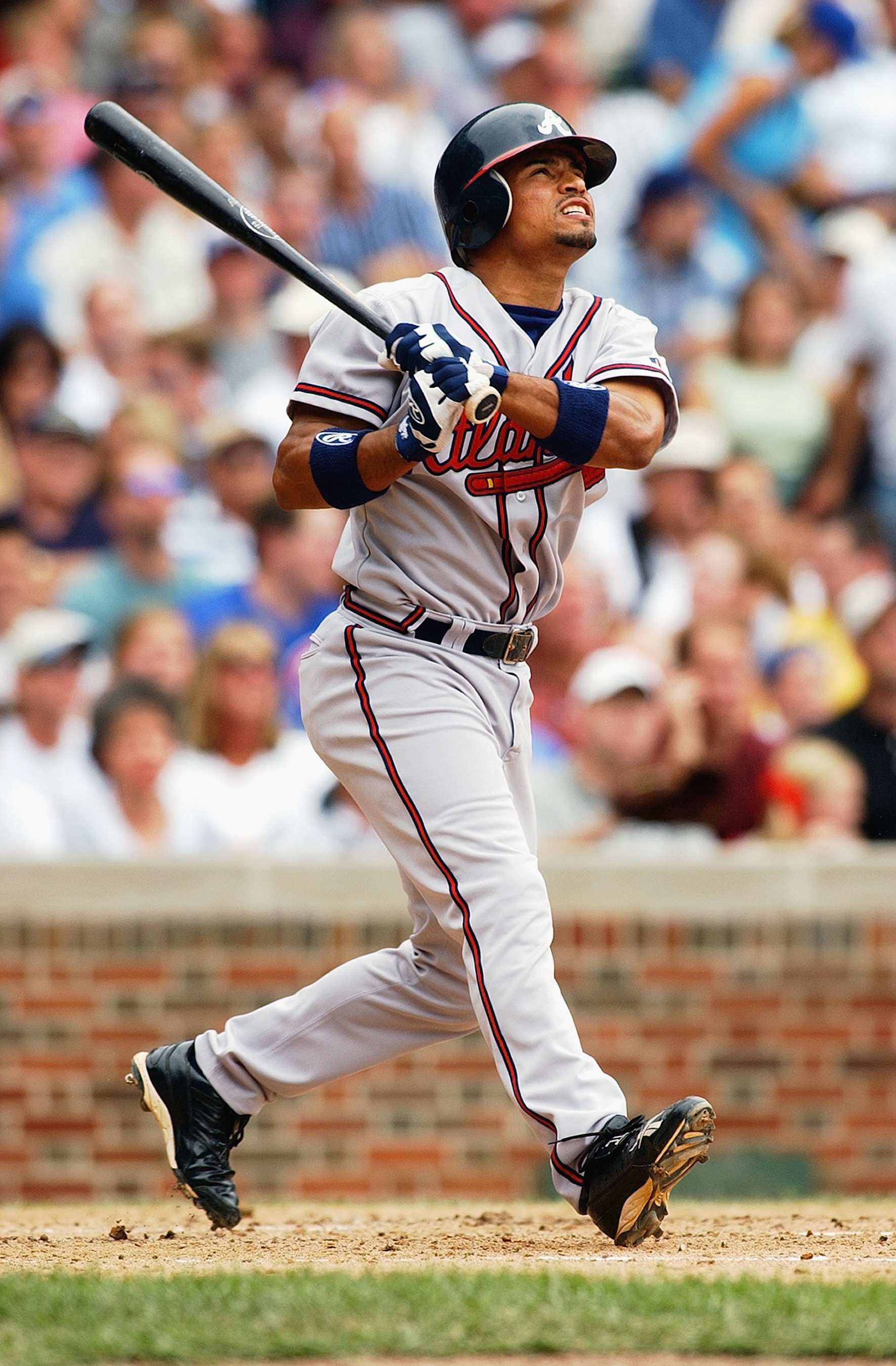 CHICAGO - JULY 11:  Shortstop Rafael Furcal #1 of the Atlanta Braves swings at a Chicago Cubs pitch during the MLB game at Wrigley Field on July 11, 2003 in Chicago, Illinois. The Braves defeated the Cubs 9-5. (Photo by Jonathan Daniel/Getty Images)