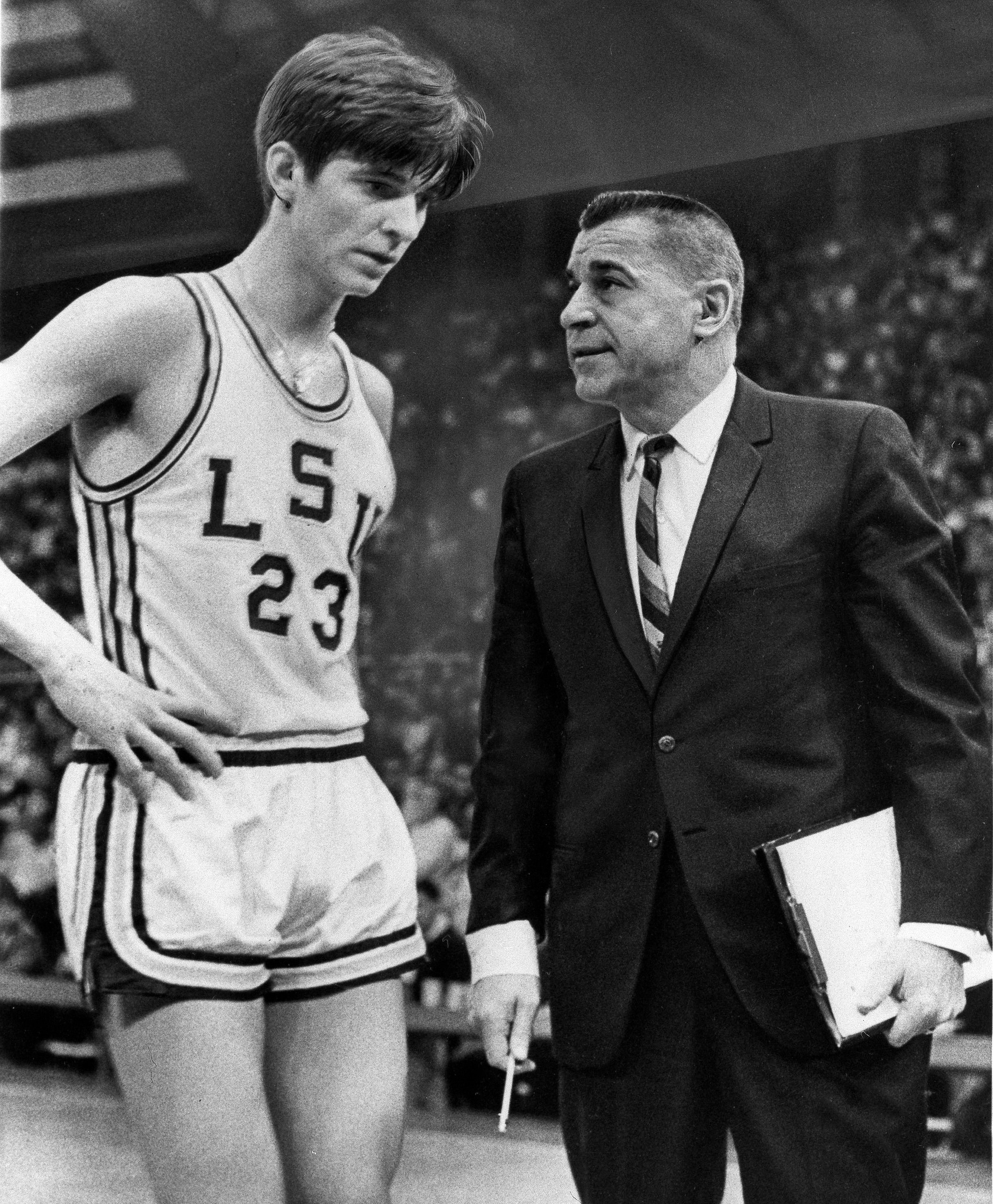 Press Maravich is pictured with his shooting star of a son, Pete of LSU, Feb. 1969. (AP Photo)