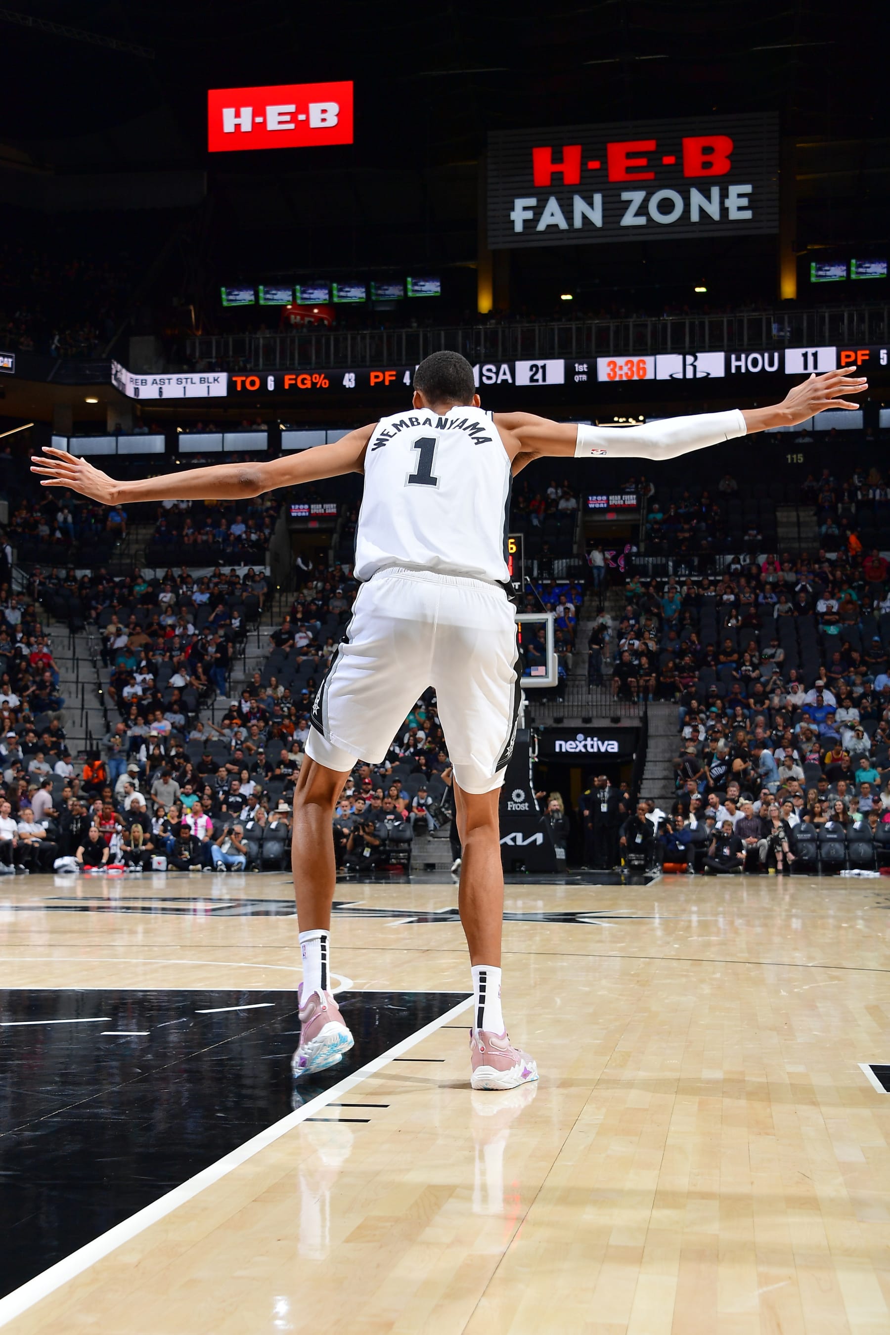 SAN ANTONIO, TX - OCTOBER 18: Victor Wembanyama #1 of the San Antonio Spurs plays defense during the preseason game on October 18, 2023 at the Frost Bank Center in San Antonio, Texas. NOTE TO USER: User expressly acknowledges and agrees that, by downloading and or using this photograph, user is consenting to the terms and conditions of the Getty Images License Agreement. Mandatory Copyright Notice: Copyright 2023 NBAE (Photos by Michael Gonzales/NBAE via Getty Images)