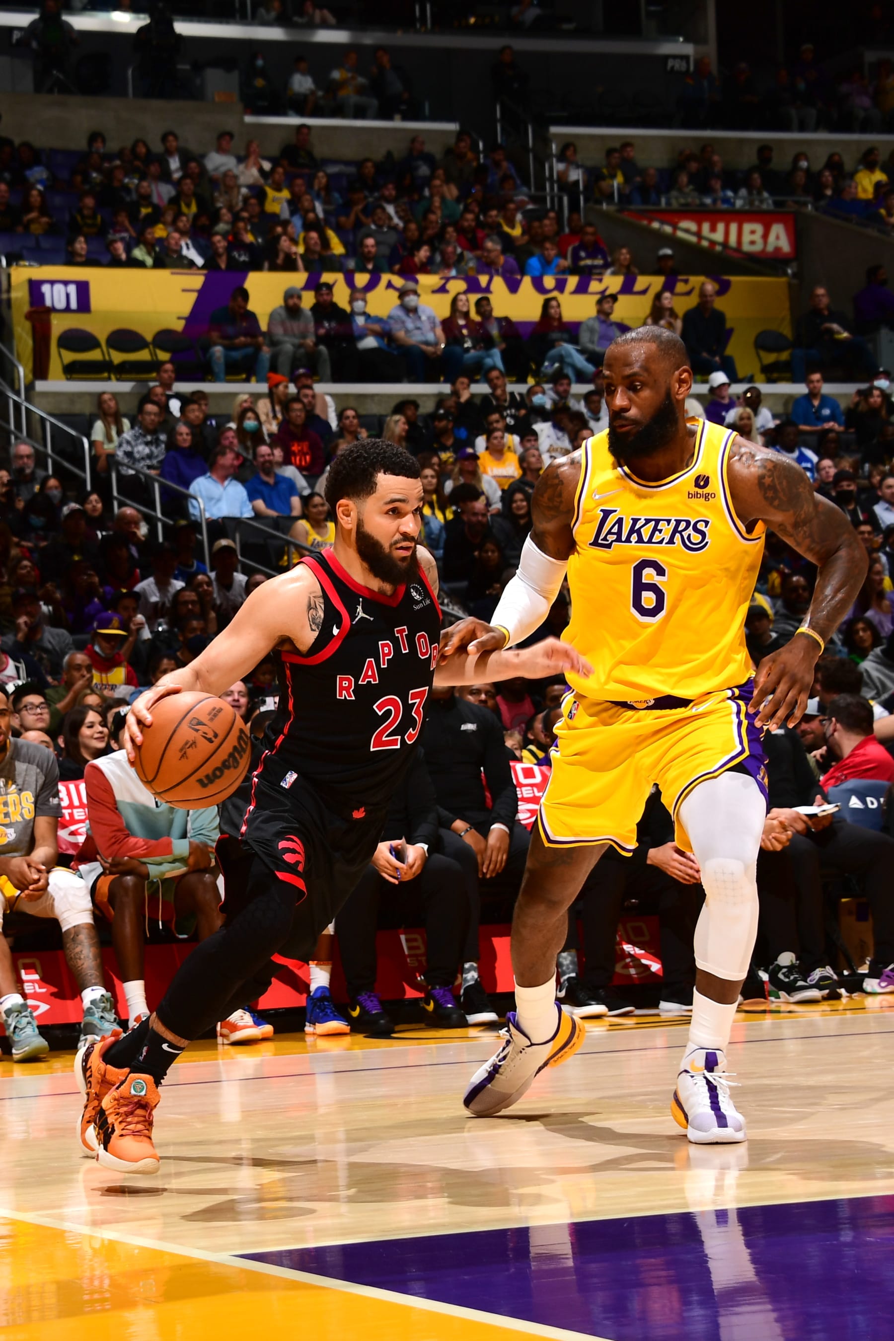 LOS ANGELES, CA - MARCH 14: LeBron James #6 of the Los Angeles Lakers plays defense on Fred VanVleet #23 of the Toronto Raptors during the game on March 14, 2022 at Crypto.Com Arena in Los Angeles, California. NOTE TO USER: User expressly acknowledges and agrees that, by downloading and/or using this Photograph, user is consenting to the terms and conditions of the Getty Images License Agreement. Mandatory Copyright Notice: Copyright 2022 NBAE (Photo by Adam Pantozzi/NBAE via Getty Images)