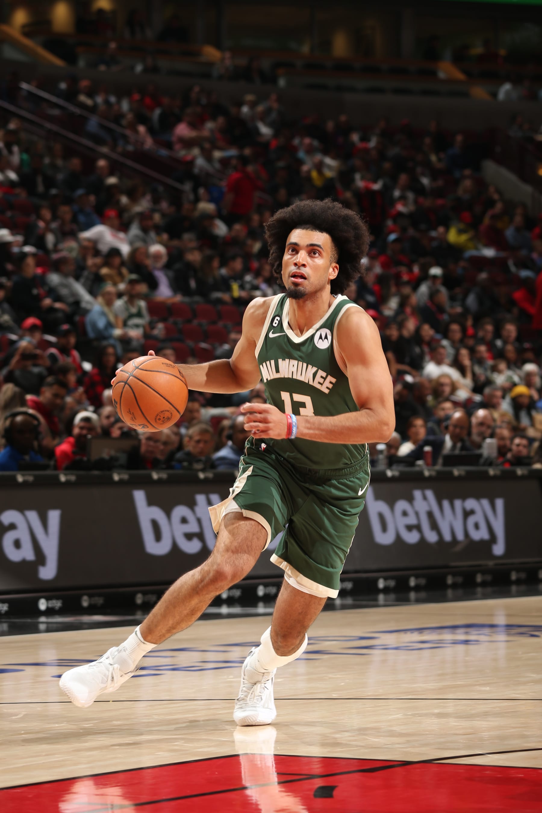 CHICAGO, IL - OCTOBER 11: Jordan Nwora #13 of the Milwaukee Bucks drives to the basket against the Chicago Bulls during a preseason game on October 11, 2022 at the United Center in Chicago, Illinois. NOTE TO USER: User expressly acknowledges and agrees that, by downloading and or using this photograph, user is consenting to the terms and conditions of the Getty Images License Agreement.  Mandatory Copyright Notice: Copyright 2022 NBAE (Photo by Gary Dineen/NBAE via Getty Images)