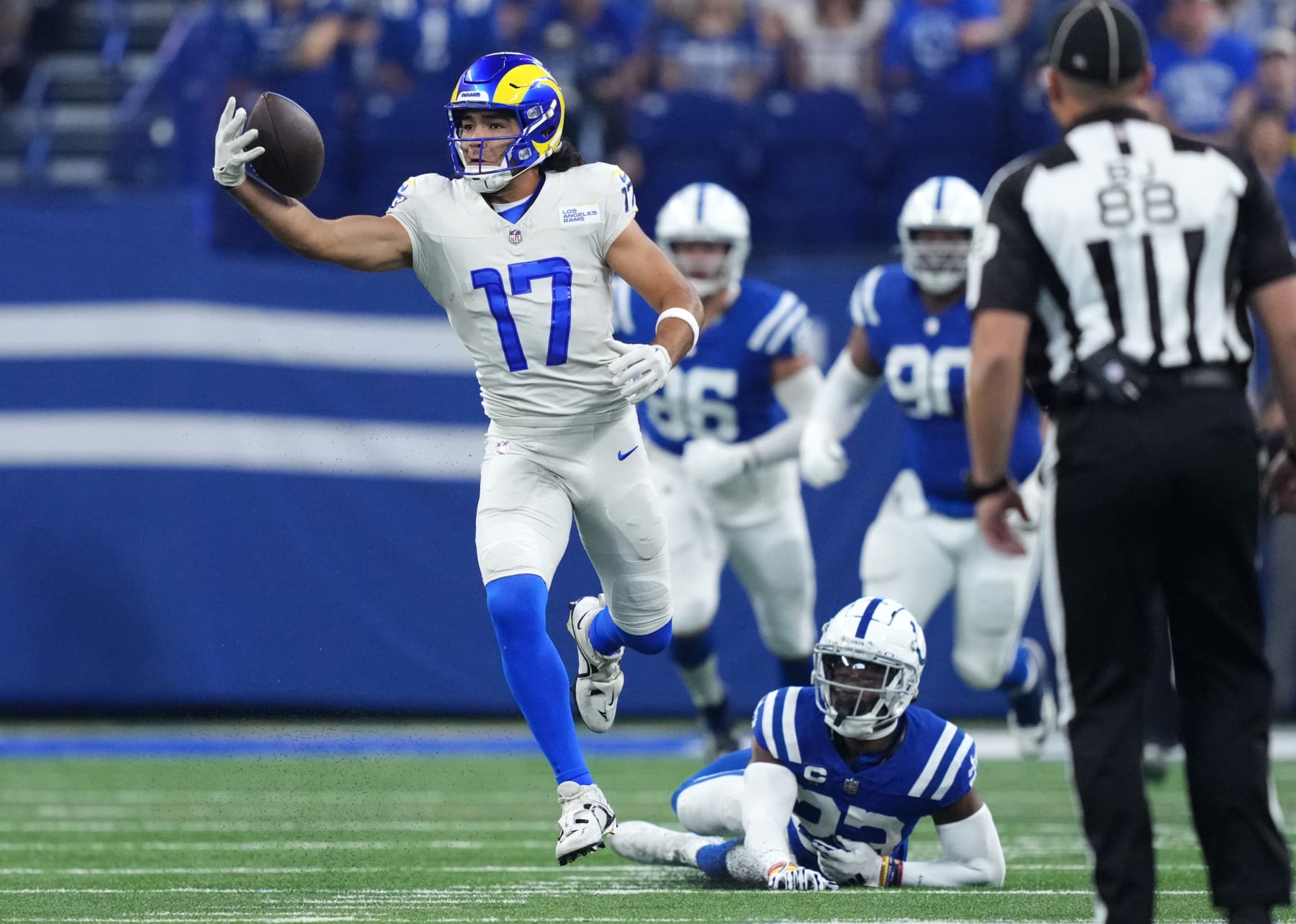 INDIANAPOLIS, INDIANA - OCTOBER 01: Puka Nacua #17 of the Los Angeles Rams catches a pass against Kenny Moore II #23 of the Indianapolis Colts during the first quarter at Lucas Oil Stadium on October 01, 2023 in Indianapolis, Indiana. (Photo by Dylan Buell/Getty Images)