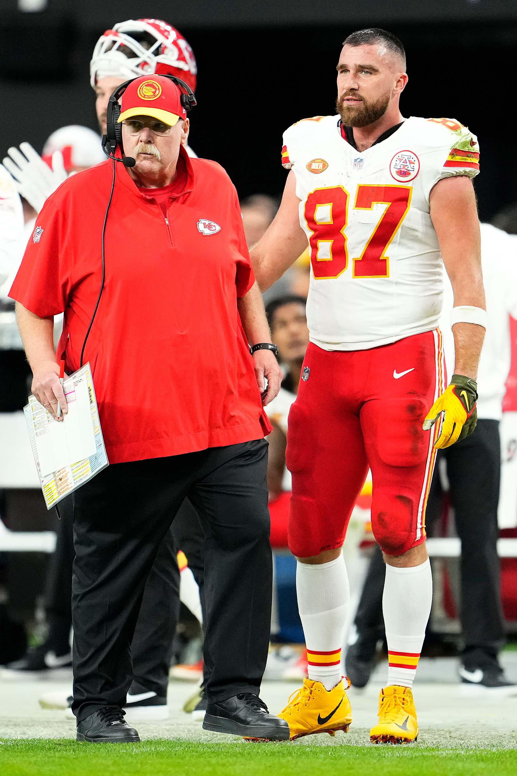 LAS VEGAS, NEVADA - NOVEMBER 26: Head coach Andy Reid and Travis Kelce #87 of the Kansas City Chiefs look on during the second quarter of a game against the Las Vegas Raiders at Allegiant Stadium on November 26, 2023 in Las Vegas, Nevada. (Photo by Jeff Bottari/Getty Images)
