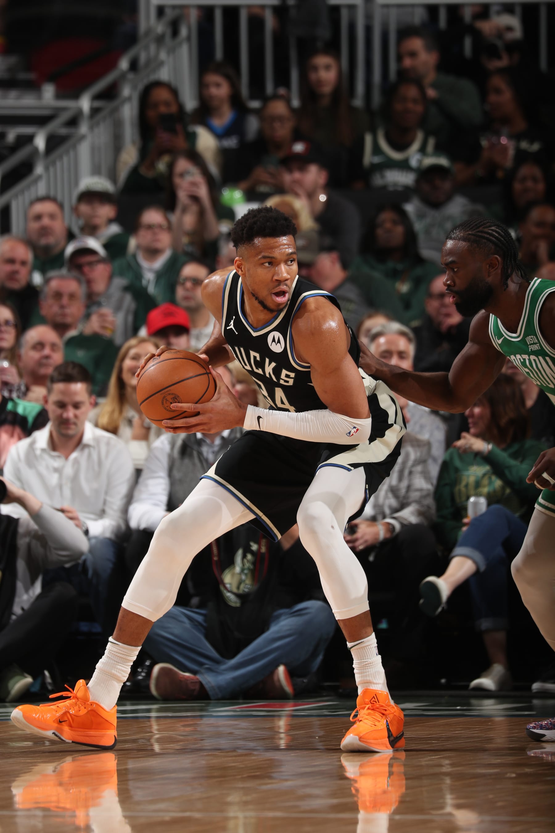 MILWAUKEE, WI - APRIL 9: Giannis Antetokounmpo #34 of the Milwaukee Bucks handles the ball during the game against the Boston Celtics on April 9, 2024 at the Fiserv Forum Center in Milwaukee, Wisconsin. NOTE TO USER: User expressly acknowledges and agrees that, by downloading and or using this Photograph, user is consenting to the terms and conditions of the Getty Images License Agreement. Mandatory Copyright Notice: Copyright 2024 NBAE (Photo by Gary Dineen/NBAE via Getty Images).