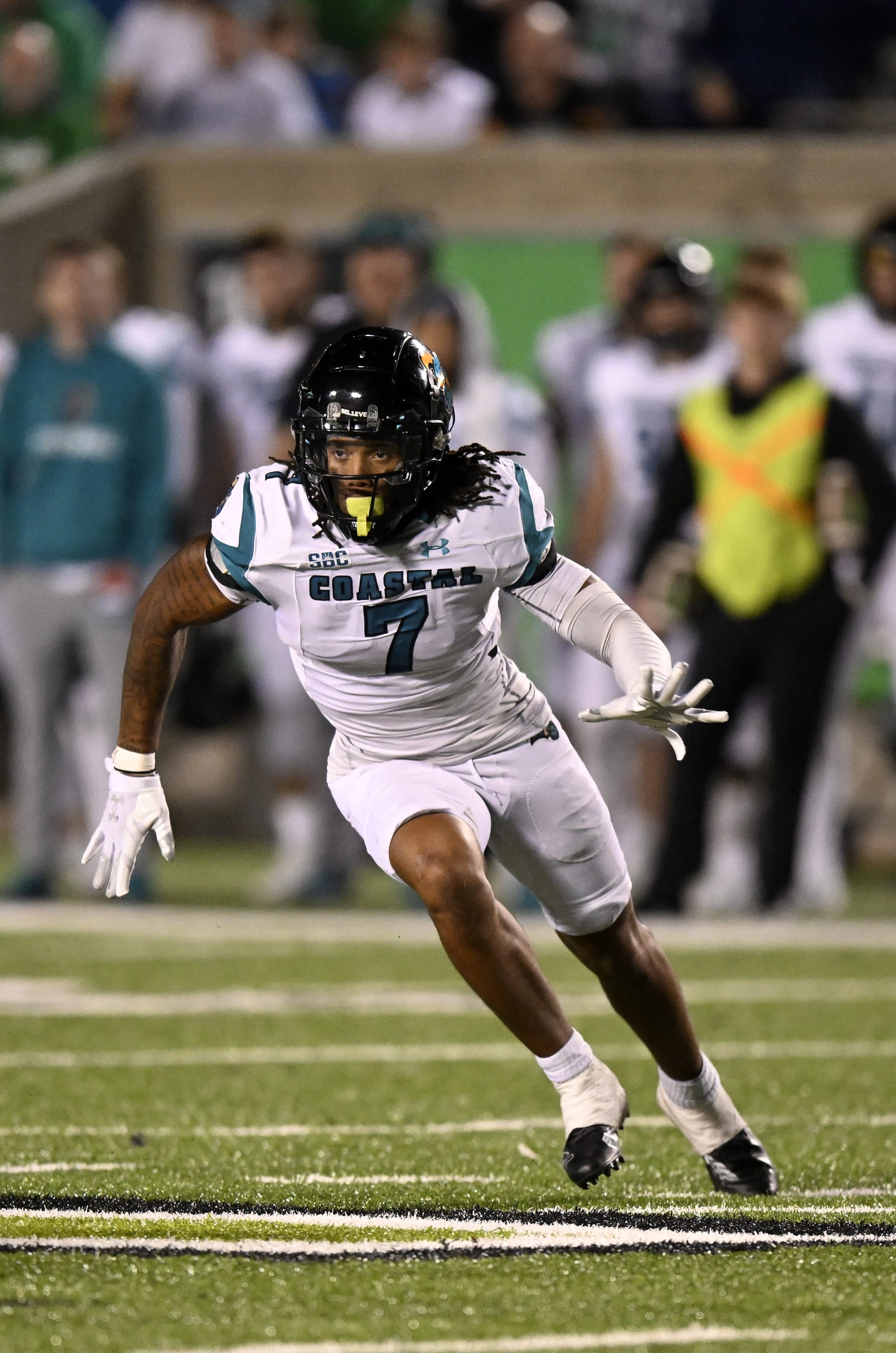 HUNTINGTON, WEST VIRGINIA - OCTOBER 29: Lance Boykin #7 of the Coastal Carolina Chanticleers defends against the Marshall Thundering Herd at Joan C. Edwards Stadium on October 29, 2022 in Huntington, West Virginia. (Photo by G Fiume/Getty Images)