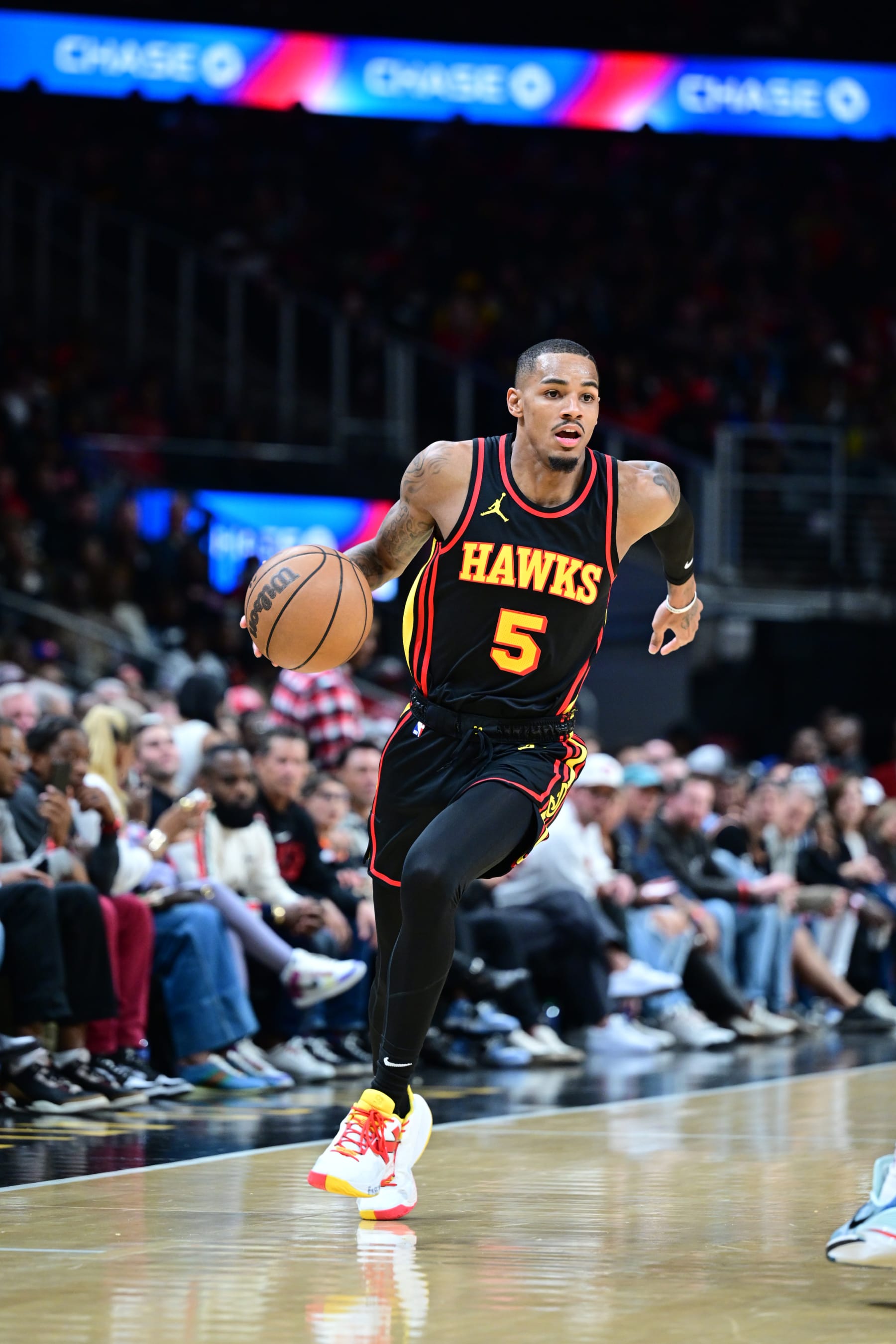 ATLANTA, GA - NOVEMBER 15: Dejounte Murray #5 of the Atlanta Hawks dribbles the ball during the game against the New York Knicks on November 15, 2023 at State Farm Arena in Atlanta, Georgia.  NOTE TO USER: User expressly acknowledges and agrees that, by downloading and/or using this Photograph, user is consenting to the terms and conditions of the Getty Images License Agreement. Mandatory Copyright Notice: Copyright 2023 NBAE (Photo by Adam Hagy/NBAE via Getty Images)