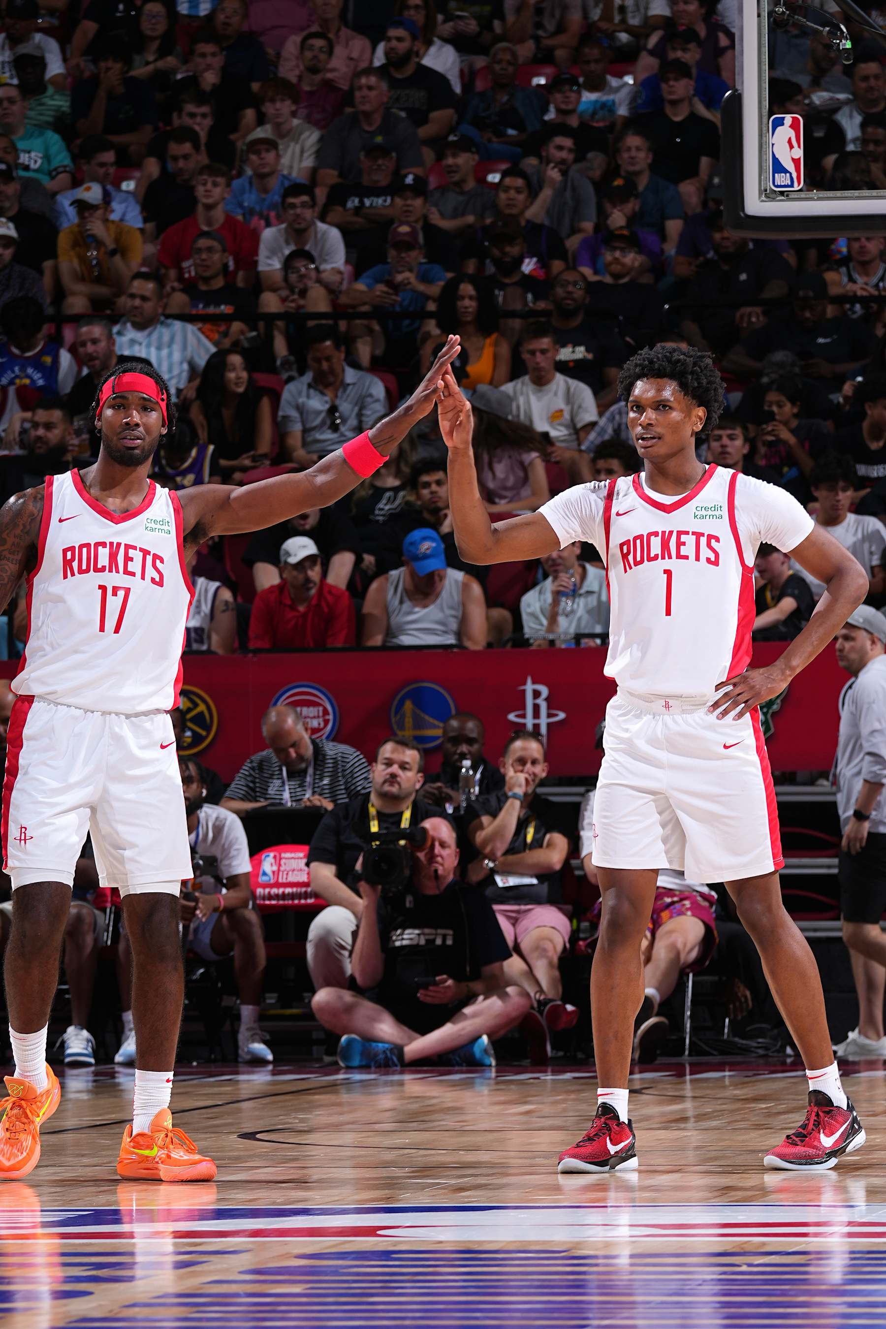 LAS VEGAS, NV - JULY 7: Tari Eason #17 of the Houston Rockets high fives Amen Thompson #1 during the 2023 NBA Las Vegas Summer League on July 7, 2023 at the Thomas & Mack Center in Las Vegas, Nevada. NOTE TO USER: User expressly acknowledges and agrees that, by downloading and or using this photograph, User is consenting to the terms and conditions of the Getty Images License Agreement. Mandatory Copyright Notice: Copyright 2023 NBAE (Photo by Bart Young/NBAE via Getty Images)