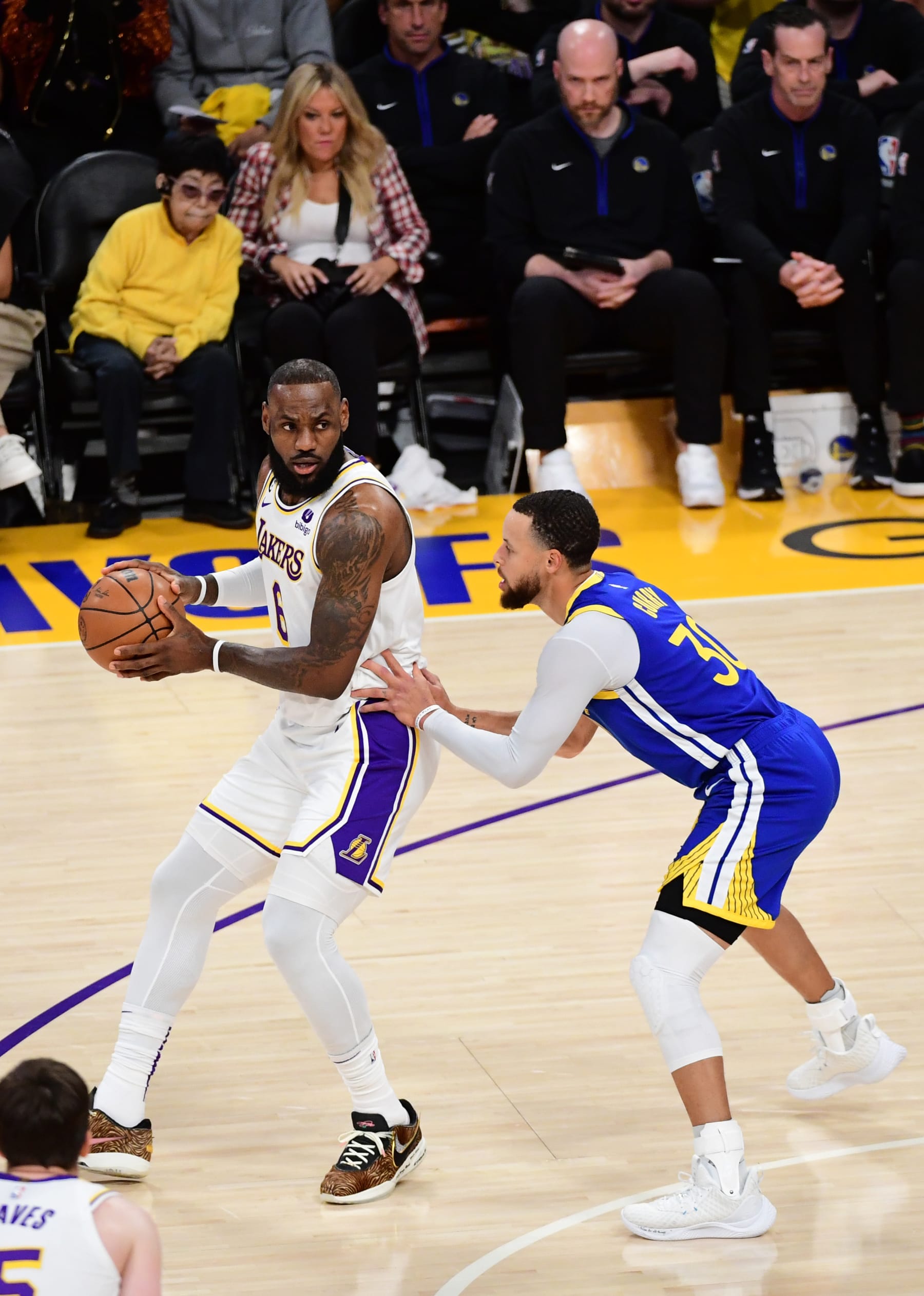 LOS ANGELES, CA - MAY 6: LeBron James #6 of the Los Angeles Lakers handles the ball against defender Stephen Curry #30 of the Golden State Warriors during Game Three of the Western Conference Semi-Finals of the 2023 NBA Playoffs on May 6, 2023 at Crypto.Com Arena in Los Angeles, California. NOTE TO USER: User expressly acknowledges and agrees that, by downloading and/or using this Photograph, user is consenting to the terms and conditions of the Getty Images License Agreement. Mandatory Copyright Notice: Copyright 2023 NBAE (Photo by Adam Pantozzi/NBAE via Getty Images)