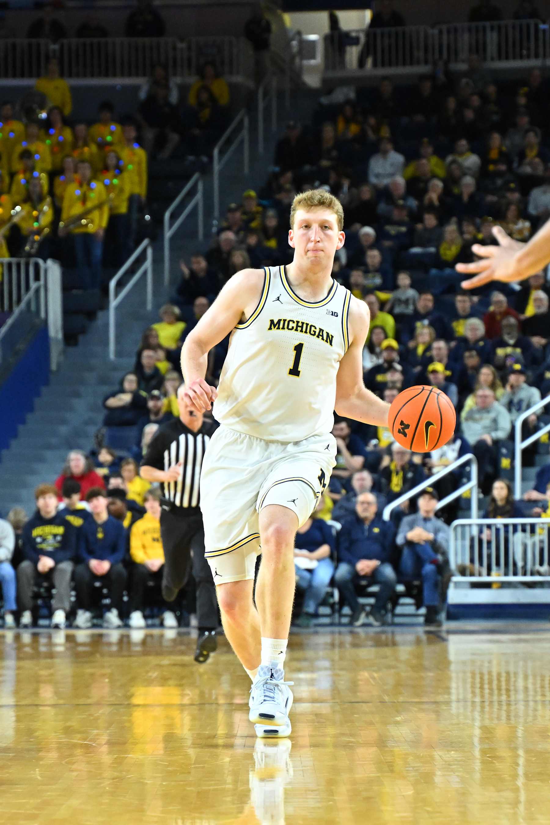 ANN ARBOR, MI - DECEMBER 07: Michigan Wolverines center Danny Wolf (1) brings the ball up court during the Michigan Wolverines versus the Iowa Hawkeyes game on Saturday December 7, 2024 at Crisler Center in Ann Arbor, MI. (Photo by Steven King/Icon Sportswire via Getty Images)