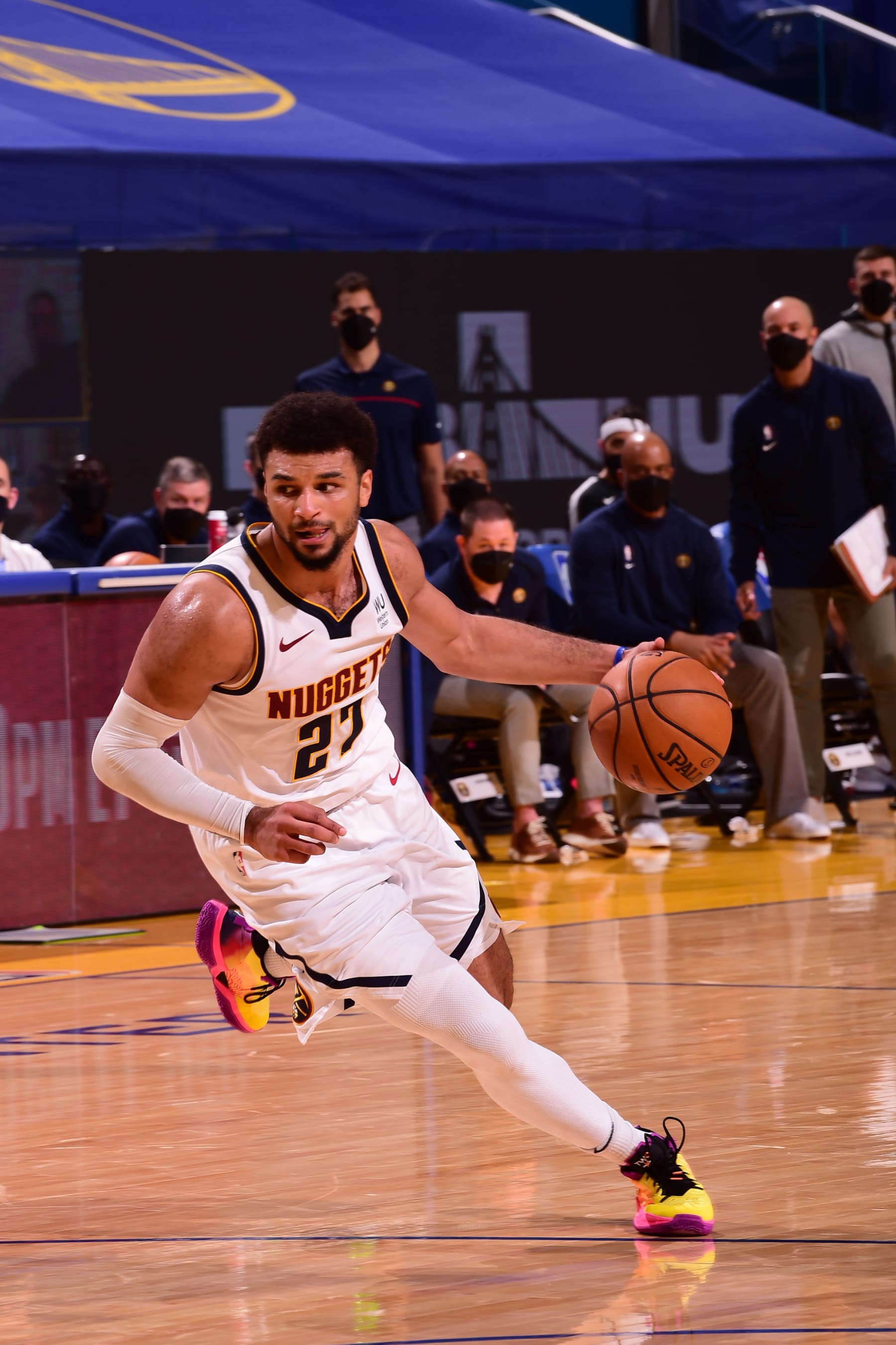 SAN FRANCISCO, CA - APRIL 12: Jamal Murray #27 of the Denver Nuggets drives to the basket during the game against the Golden State Warriors on April 12, 2021 at Chase Center in San Francisco, California. NOTE TO USER: User expressly acknowledges and agrees that, by downloading and or using this photograph, user is consenting to the terms and conditions of Getty Images License Agreement. Mandatory Copyright Notice: Copyright 2021 NBAE (Photo by Noah Graham/NBAE via Getty Images)
