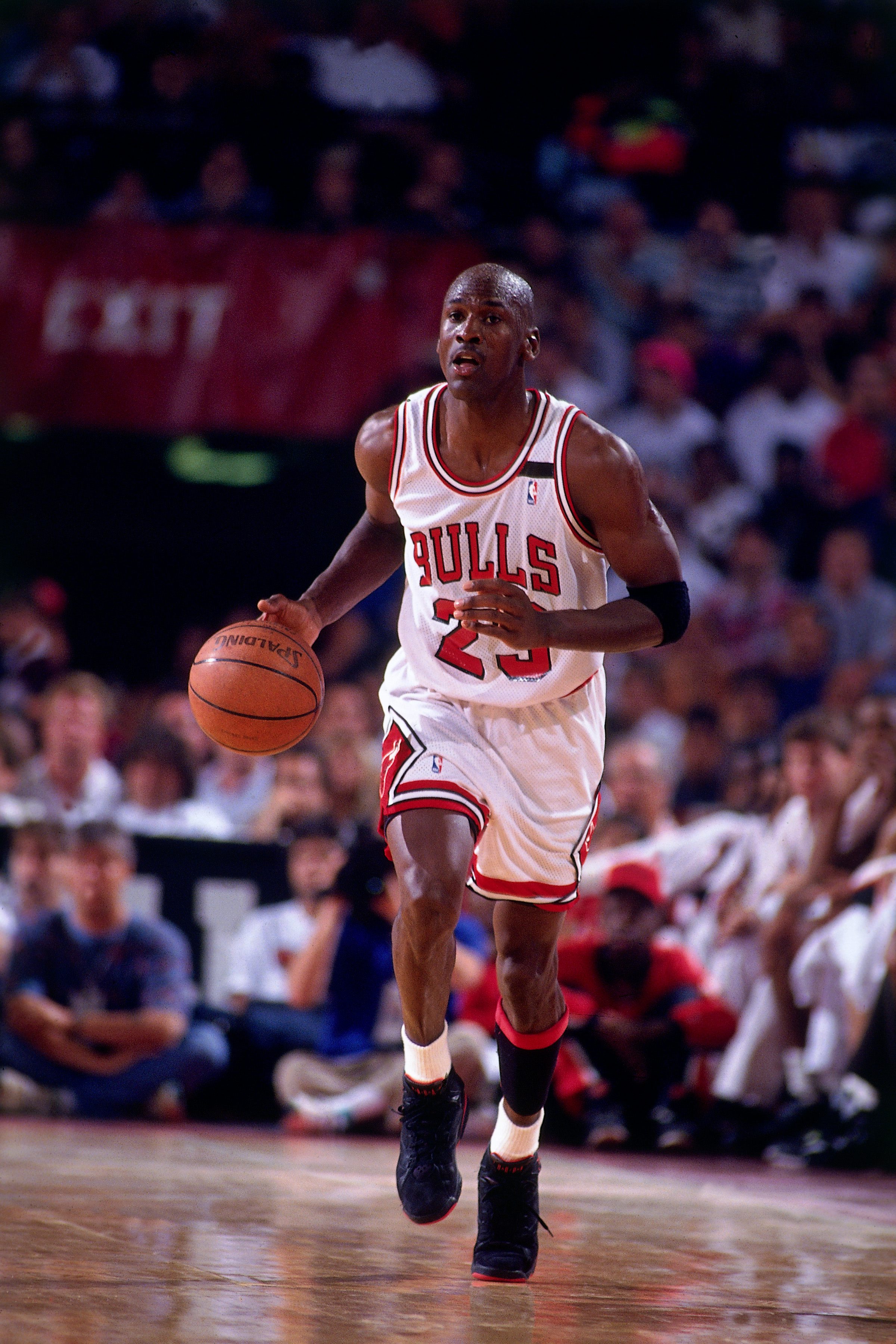 CHICAGO - JUNE 14:  Michael Jordan #23 of the Chicago Bulls drives the ball up court against the Portland Trail blazers during game six of the NBA Finals played on June 14, 1992 at Chicago Stadium in Chicago, Illinois.  NOTE TO USER: User expressly acknowledges and agrees that, by downloading and/or using this Photograph, user is consenting to the terms and conditions of the Getty Images License Agreement.  Mandatory Copyright Notice:  Copyright 1992 NBAE  (Photo by Nathaniel S. Butler/NBAE via Getty Images)