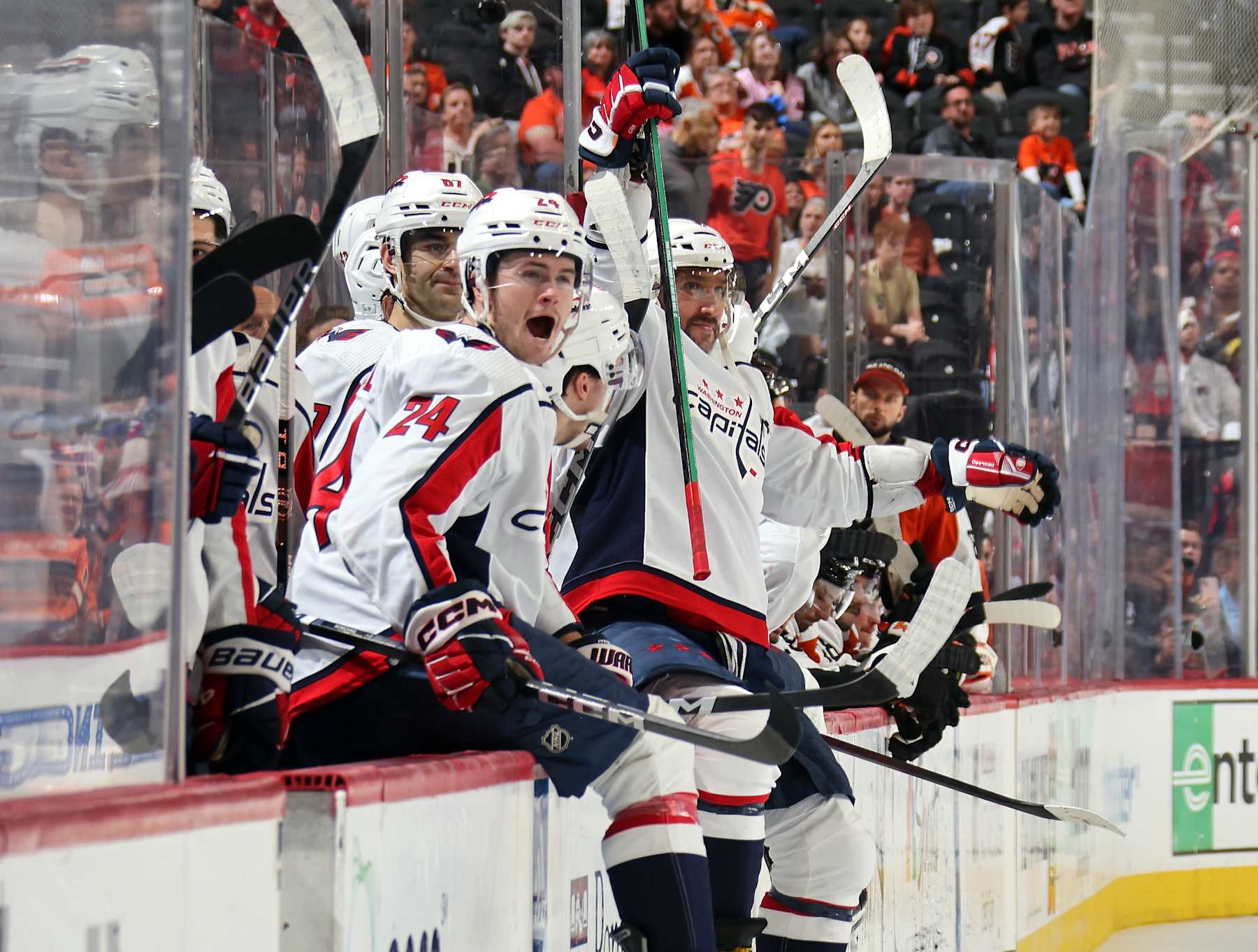 PHILADELPHIA, PENNSYLVANIA - APRIL 16:  Alex Ovechkin #8 of the Washington Capitals celebrates with teammates after defeating the Philadelphia Flyers 2-1 at the Wells Fargo Center on April 16, 2024 in Philadelphia, Pennsylvania. With tonight's win, the Capitals have reached the NHL playoffs.  (Photo by Len Redkoles/NHLI via Getty Images)