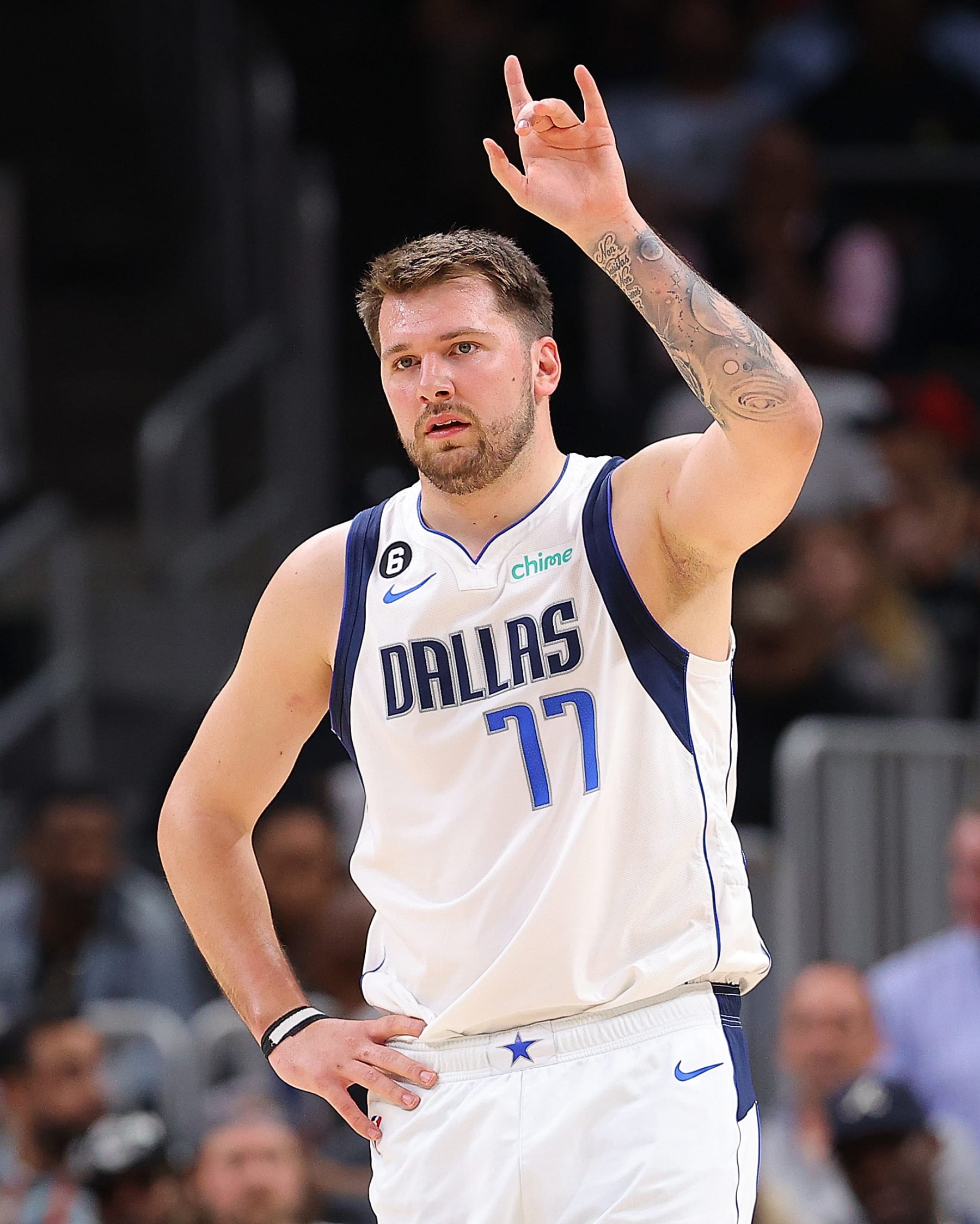 ATLANTA, GEORGIA - APRIL 02:  Luka Doncic #77 of the Dallas Mavericks reacts against the Atlanta Hawks during the first quarter at State Farm Arena on April 02, 2023 in Atlanta, Georgia.  NOTE TO USER: User expressly acknowledges and agrees that, by downloading and or using this photograph, User is consenting to the terms and conditions of the Getty Images License Agreement.  (Photo by Kevin C. Cox/Getty Images)