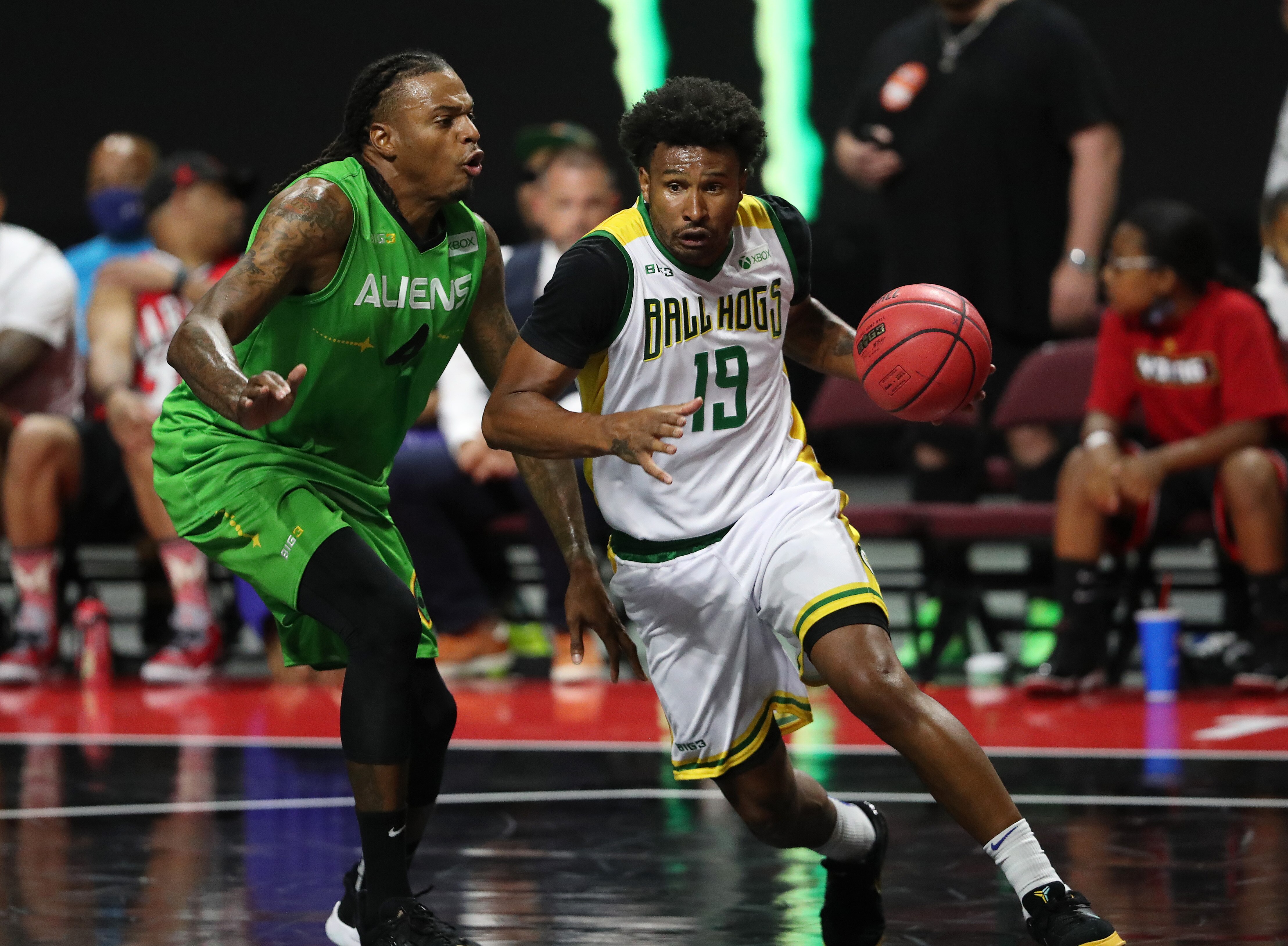 LAS VEGAS, NEVADA - JULY 18: Leonardo Barbosa #19 of Ball Hogs drives to the basket against Brandon Rush #4 of Aliens during week two of the BIG3 at the Orleans Arena on July 18, 2021 in Las Vegas, Nevada. (Photo by Steve Marcus/Getty Images)