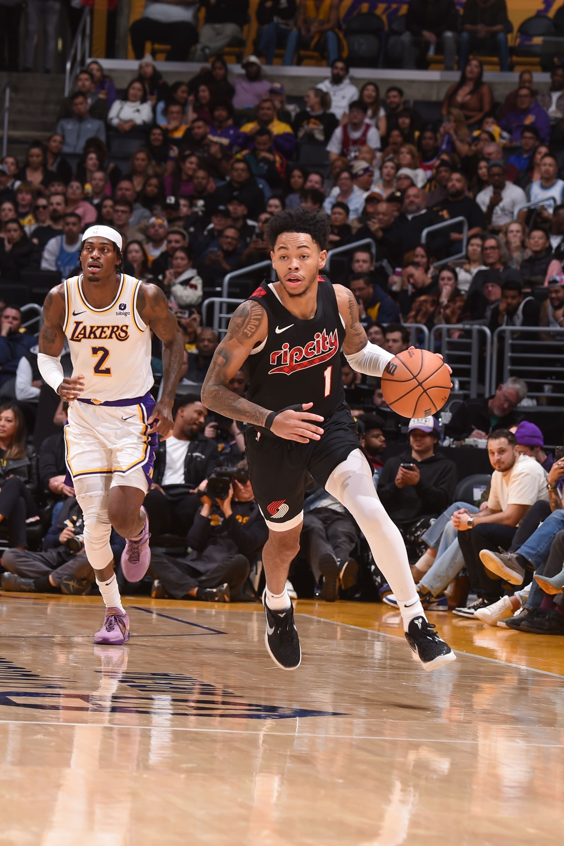 LOS ANGELES, CA - JANUARY 21:  Anfernee Simons #1 of the Portland Trail Blazers goes to the basket during the game on January 21, 2024 at Crypto.Com Arena in Los Angeles, California. NOTE TO USER: User expressly acknowledges and agrees that, by downloading and/or using this Photograph, user is consenting to the terms and conditions of the Getty Images License Agreement. Mandatory Copyright Notice: Copyright 2024 NBAE (Photo by Juan Ocampo/NBAE via Getty Images)