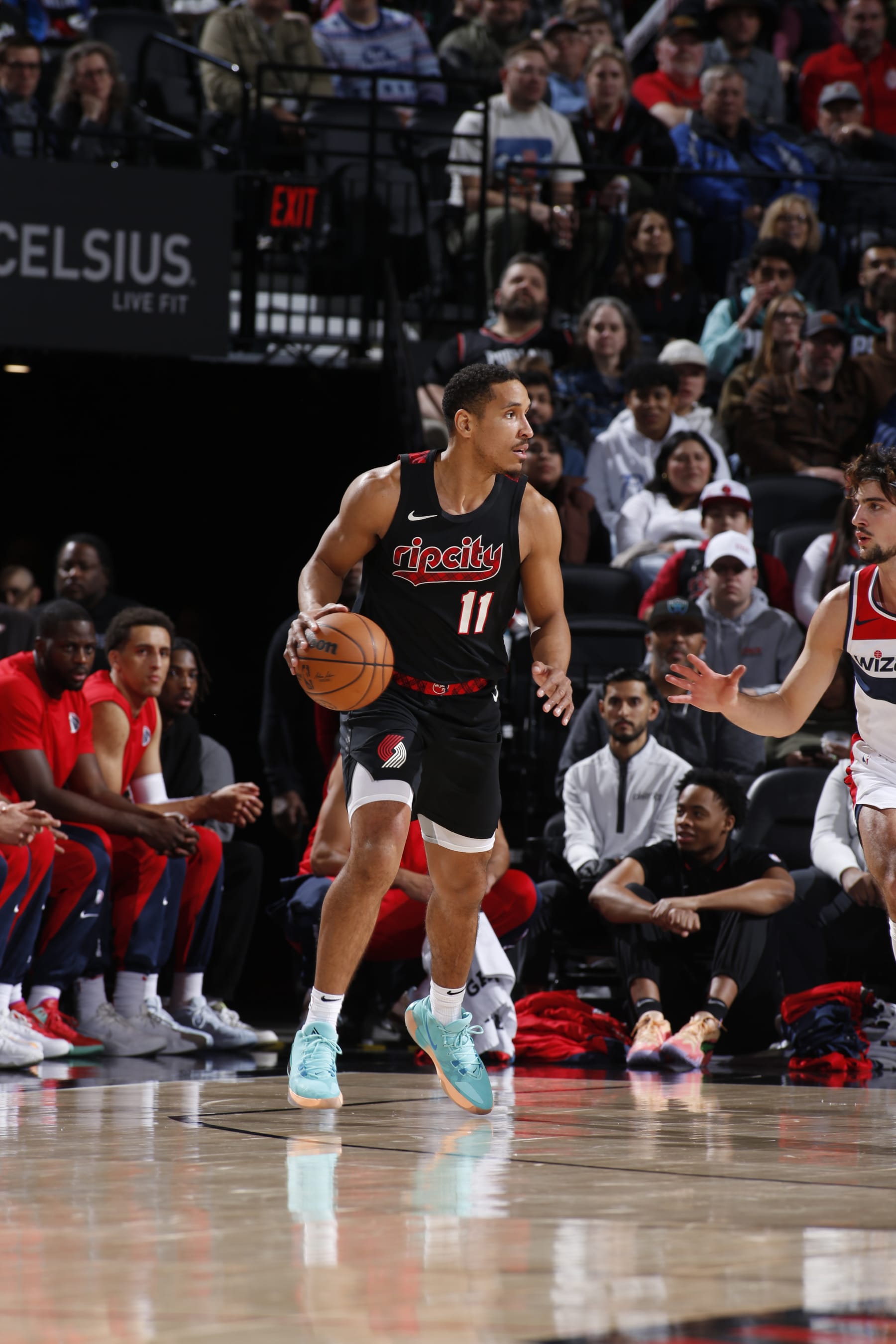 PORTLAND, OR - DECEMBER 21: Malcolm Brogdon #11 of the Portland Trail Blazers handles the ball during the game against the Washington Wizards on December 21, 2023 at the Moda Center Arena in Portland, Oregon. NOTE TO USER: User expressly acknowledges and agrees that, by downloading and or using this photograph, user is consenting to the terms and conditions of the Getty Images License Agreement. Mandatory Copyright Notice: Copyright 2023 NBAE (Photo by Cameron Browne/NBAE via Getty Images)
