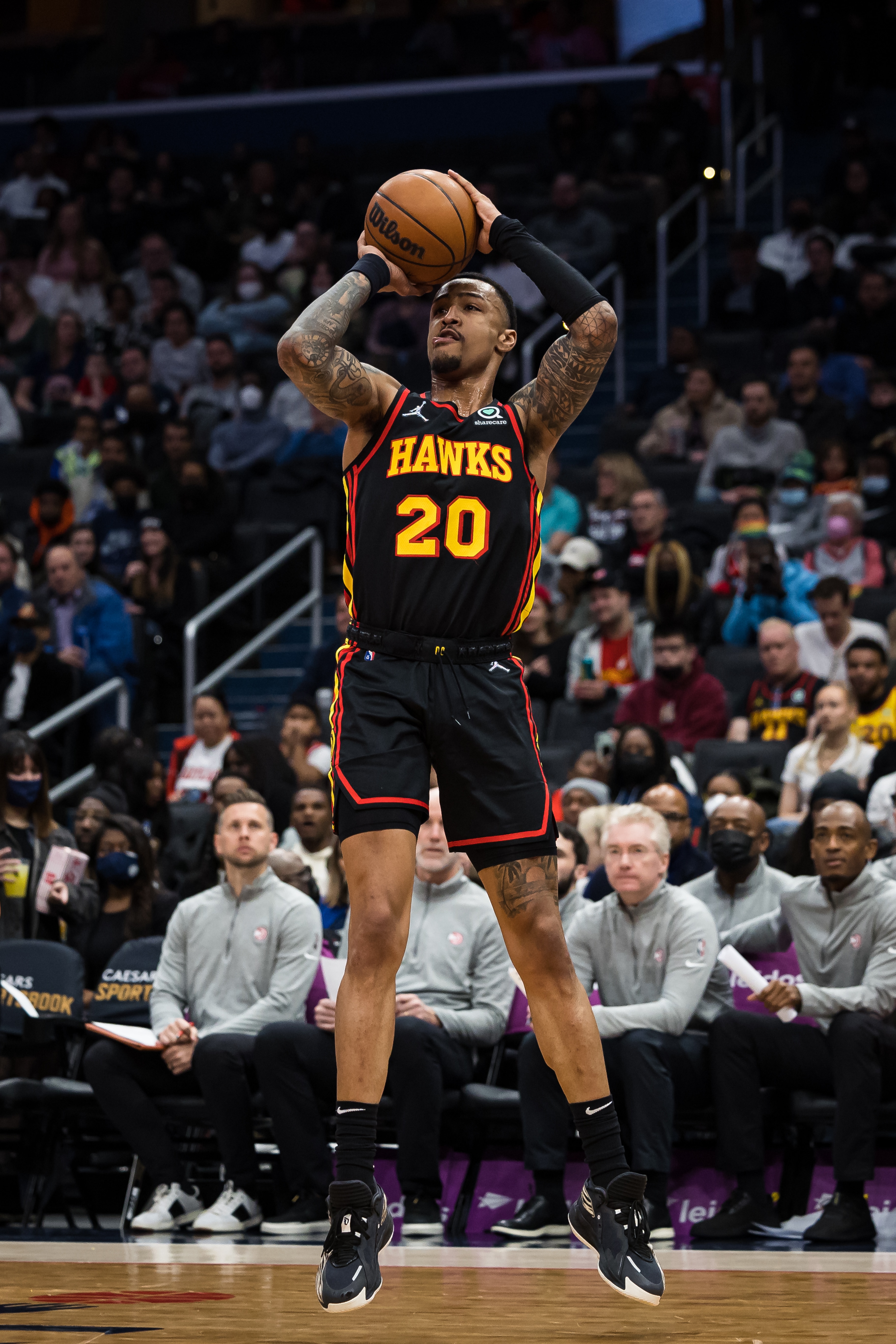 WASHINGTON, DC - MARCH 04: John Collins #20 of the Atlanta Hawks shoots the ball against the Washington Wizards during the first half at Capital One Arena on March 4, 2022 in Washington, DC. NOTE TO USER: User expressly acknowledges and agrees that, by downloading and or using this photograph, User is consenting to the terms and conditions of the Getty Images License Agreement. (Photo by Scott Taetsch/Getty Images)