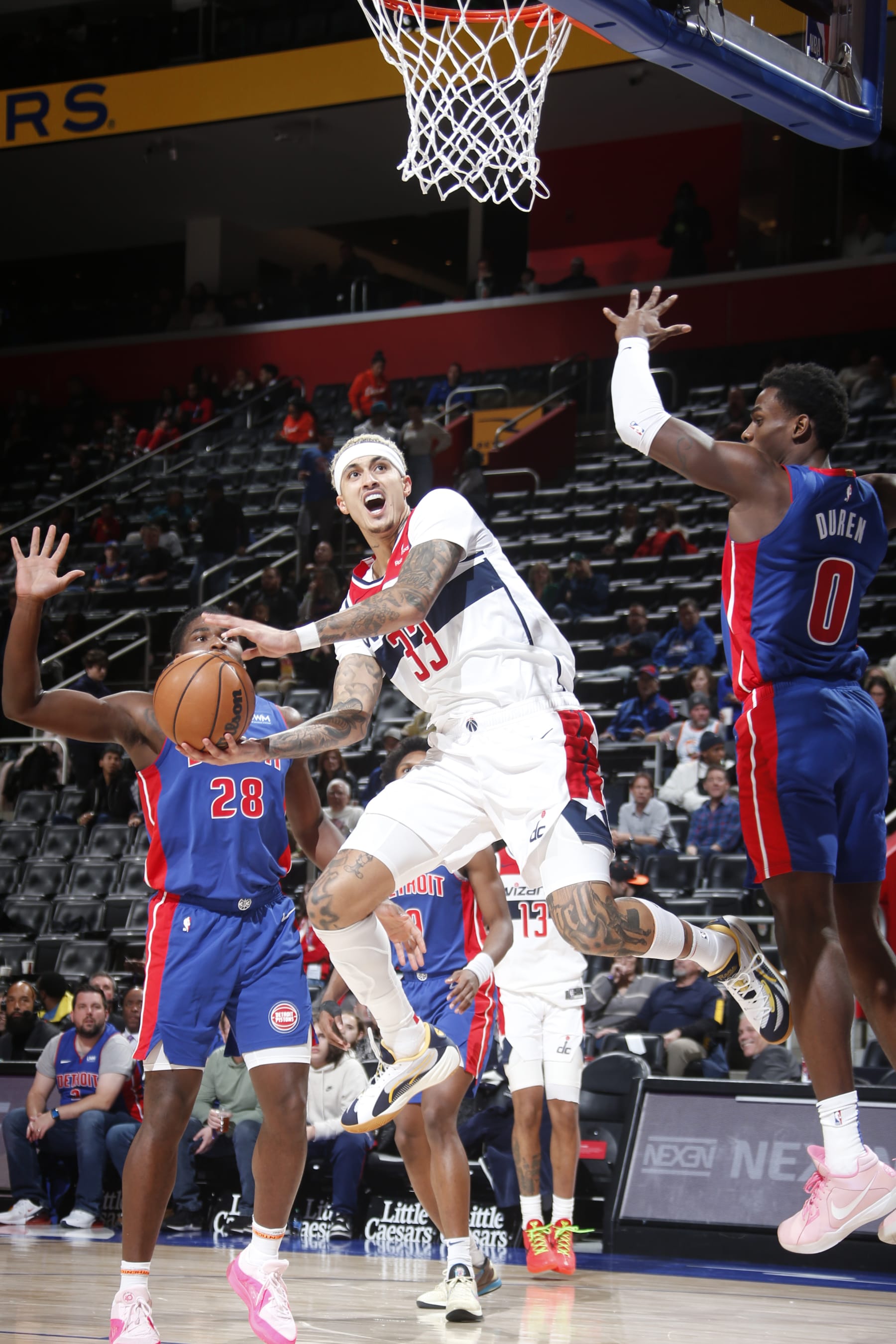 DETROIT, MI - NOVEMBER 27:  Kyle Kuzma #33 of the Washington Wizards drives to the basket during the game against the Detroit Pistons on November 27, 2023 at Little Caesars Arena in Detroit, Michigan. NOTE TO USER: User expressly acknowledges and agrees that, by downloading and/or using this photograph, User is consenting to the terms and conditions of the Getty Images License Agreement. Mandatory Copyright Notice: Copyright 2023 NBAE (Photo by Brian Sevald/NBAE via Getty Images)