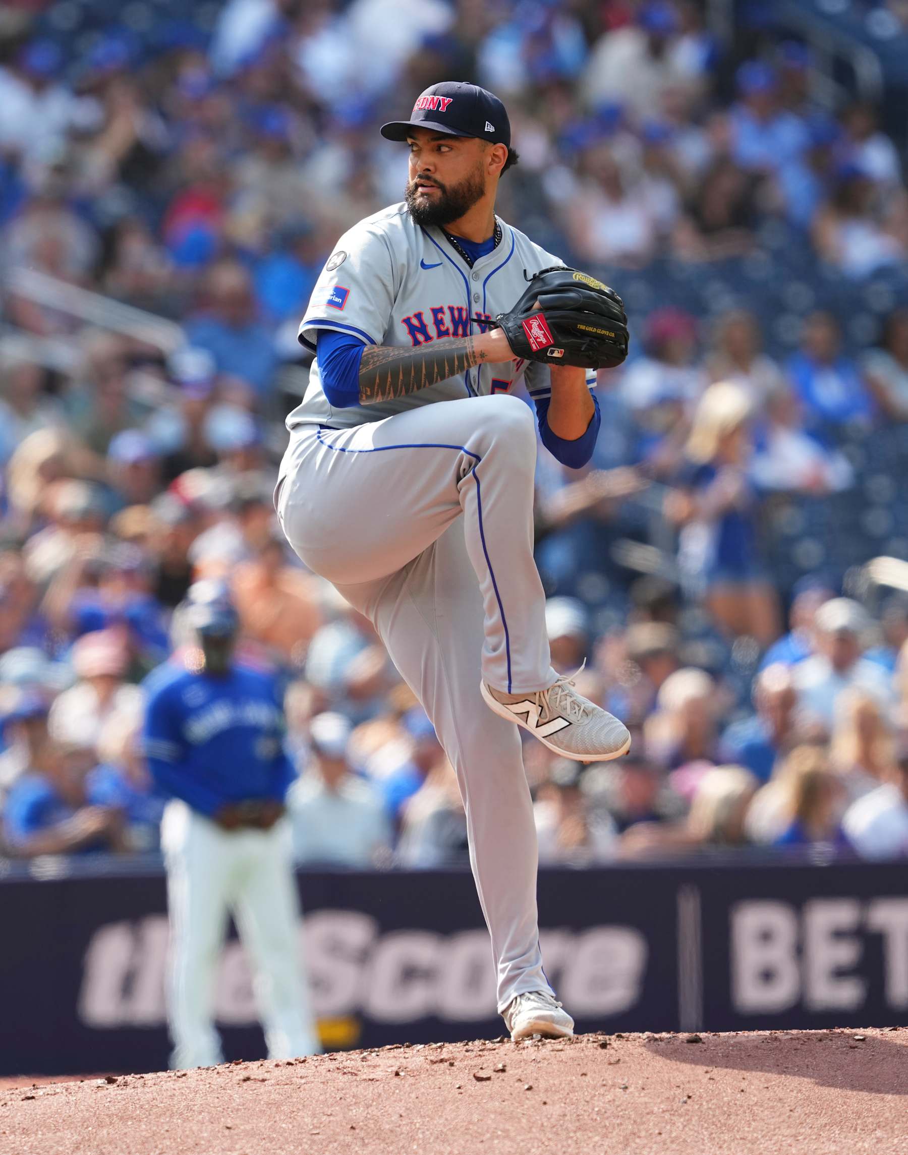 TORONTO, ON - SEPTEMBER 11: Sean Manaea #59 of the New York Mets pitches against the Toronto Blue Jays during the first inning in their MLB game at the Rogers Centre on September 11, 2024 in Toronto, Ontario, Canada. (Photo by Mark Blinch/Getty Images)