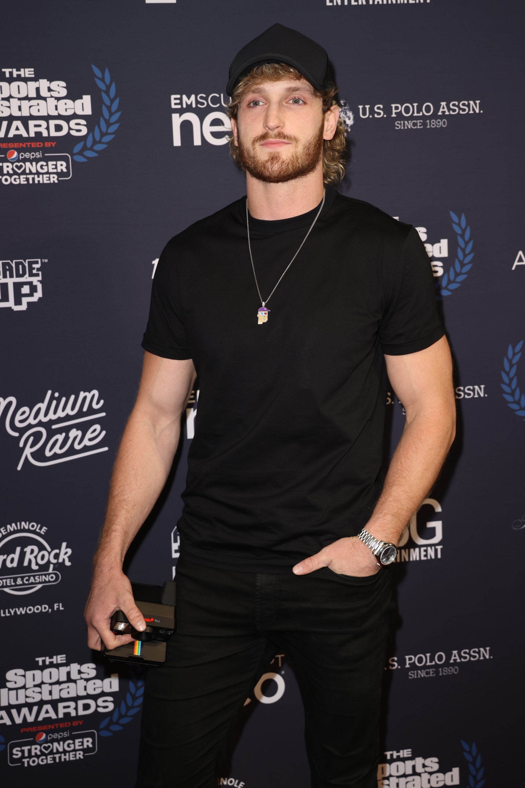 HOLLYWOOD, FLORIDA - DECEMBER 07: Logan Paul attends The 2021 Sports Illustrated Awards at Seminole Hard Rock Hotel & Casino on December 07, 2021 in Hollywood, Florida. (Photo by Rodrigo Varela/Getty Images)