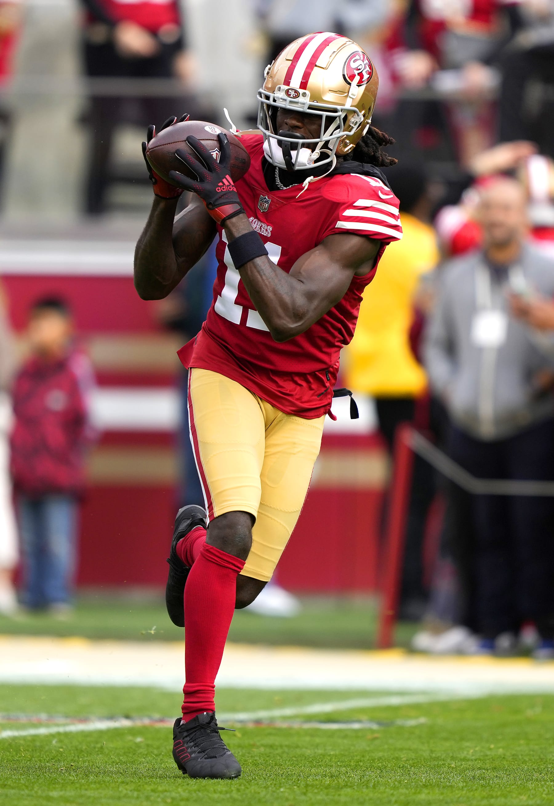 SANTA CLARA, CALIFORNIA - JANUARY 08: Brandon Aiyuk #11 of the San Francisco 49ers warms up during pregame warm ups prior to the start of the game against the Arizona Cardinals at Levi's Stadium on January 08, 2023 in Santa Clara, California. (Photo by Thearon W. Henderson/Getty Images)