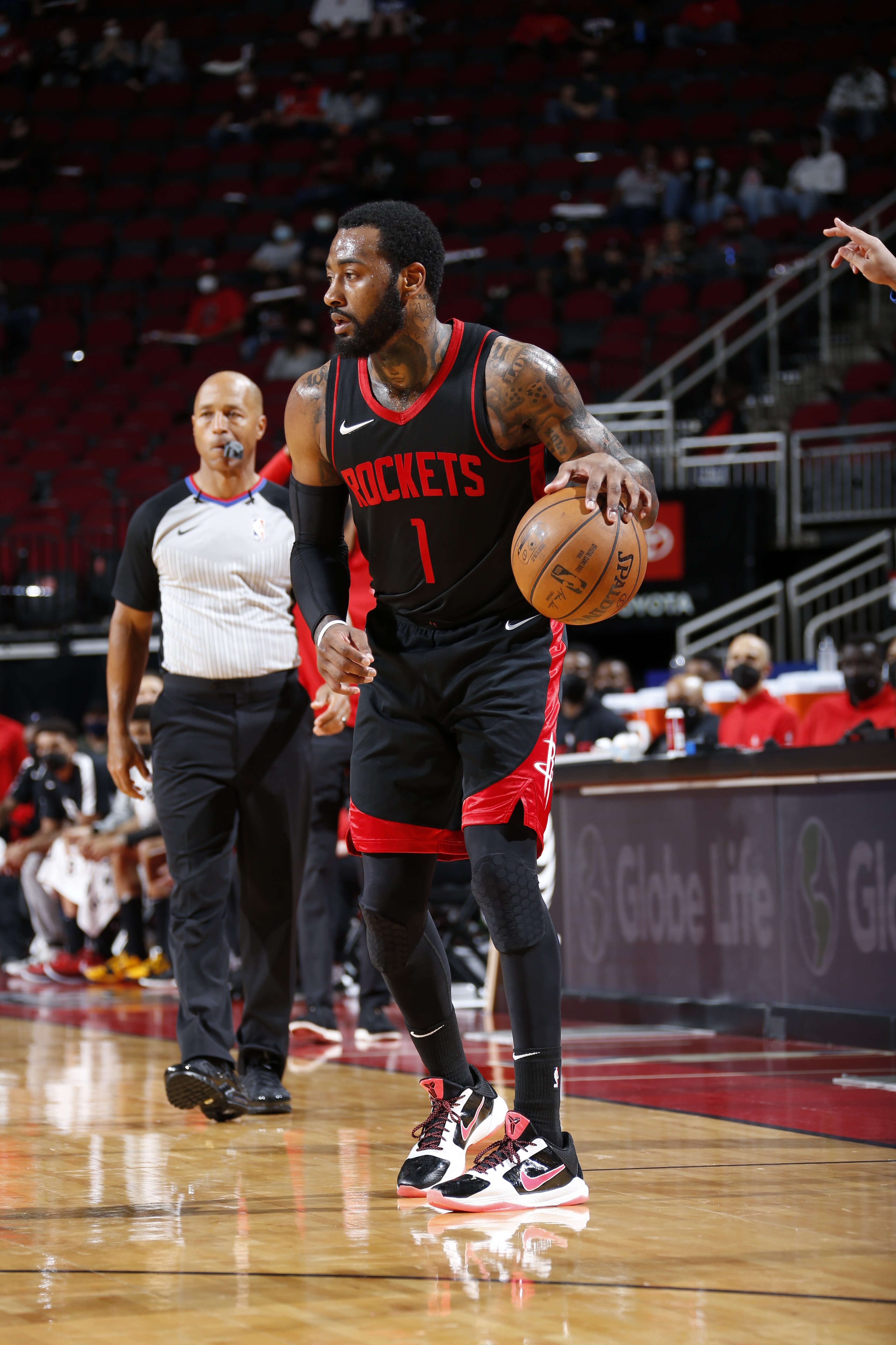 HOUSTON, TX - APRIL 23: John Wall #1 of the Houston Rockets dribbles during the game against the Los Angeles Clippers on April 23, 2021 at the Toyota Center in Houston, Texas. NOTE TO USER: User expressly acknowledges and agrees that, by downloading and or using this photograph, User is consenting to the terms and conditions of the Getty Images License Agreement. Mandatory Copyright Notice: Copyright 2021 NBAE (Photo by Troy Fields/NBAE via Getty Images)