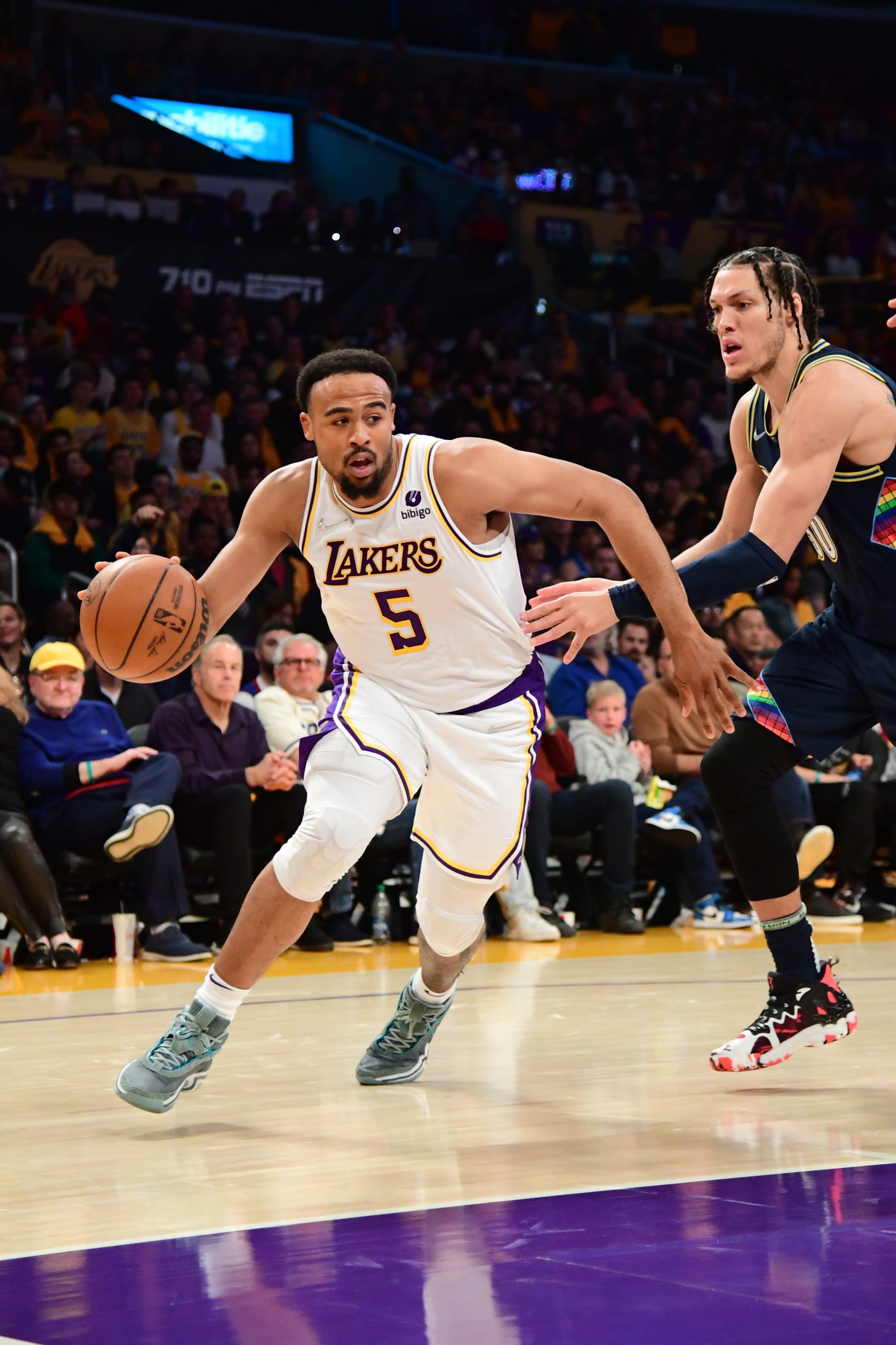 LOS ANGELES, CA - APRIL 3: Talen Horton-Tucker #5 of the Los Angeles Lakers drives to the basket during the game against the Denver Nuggets on April 3, 2022 at Crypto.Com Arena in Los Angeles, California. NOTE TO USER: User expressly acknowledges and agrees that, by downloading and/or using this Photograph, user is consenting to the terms and conditions of the Getty Images License Agreement. Mandatory Copyright Notice: Copyright 2022 NBAE (Photo by Adam Pantozzi/NBAE via Getty Images)