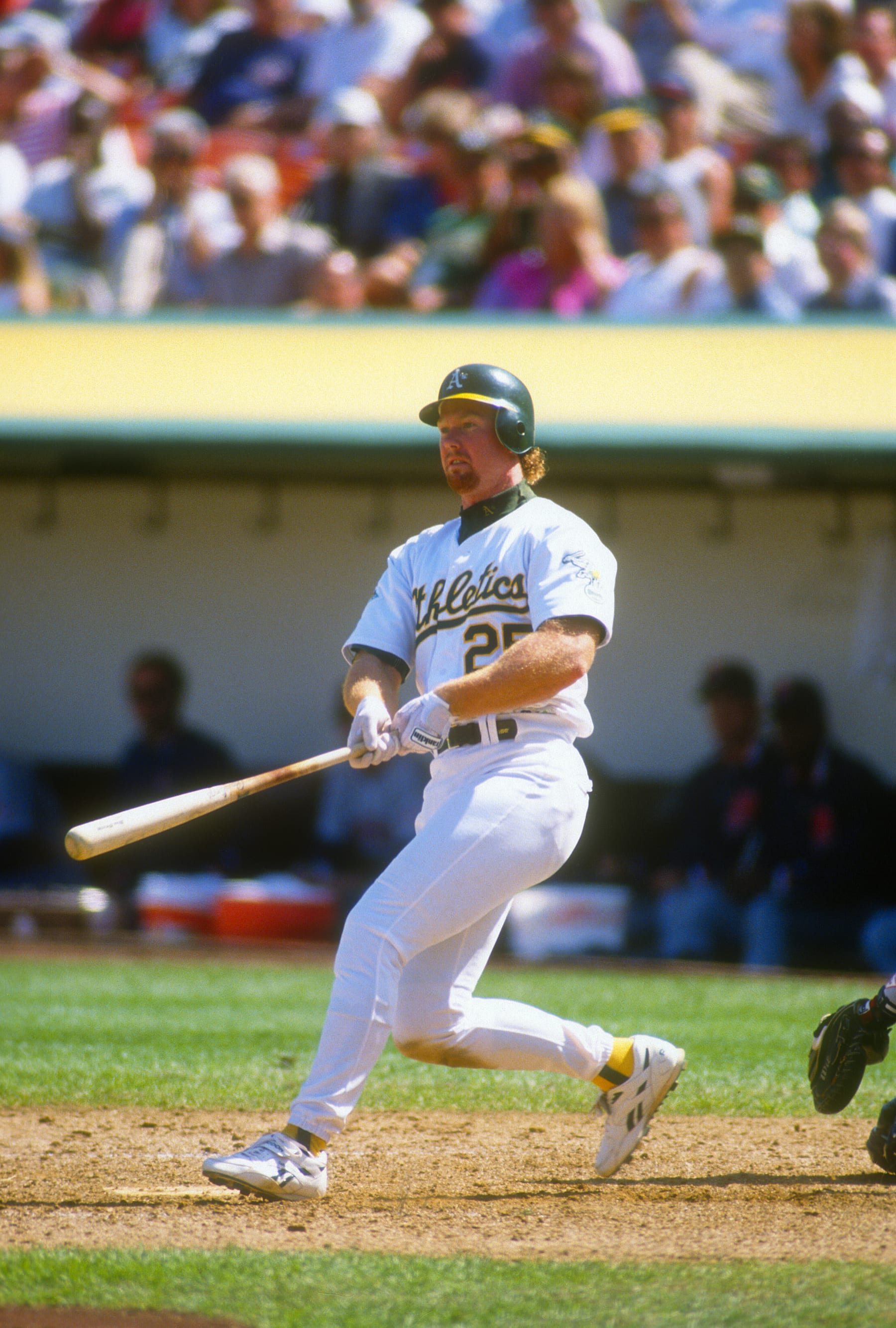 OAKLAND, CA - CIRCA 1995: Mark McGwire #25 of the Oakland Athletics bats during an Major League Baseball game circa 1995 at the Oakland-Alameda County Coliseum in Oakland, California. McGwire played for the Athletics from 1986-1997. (Photo by Focus on Sport/Getty Images)