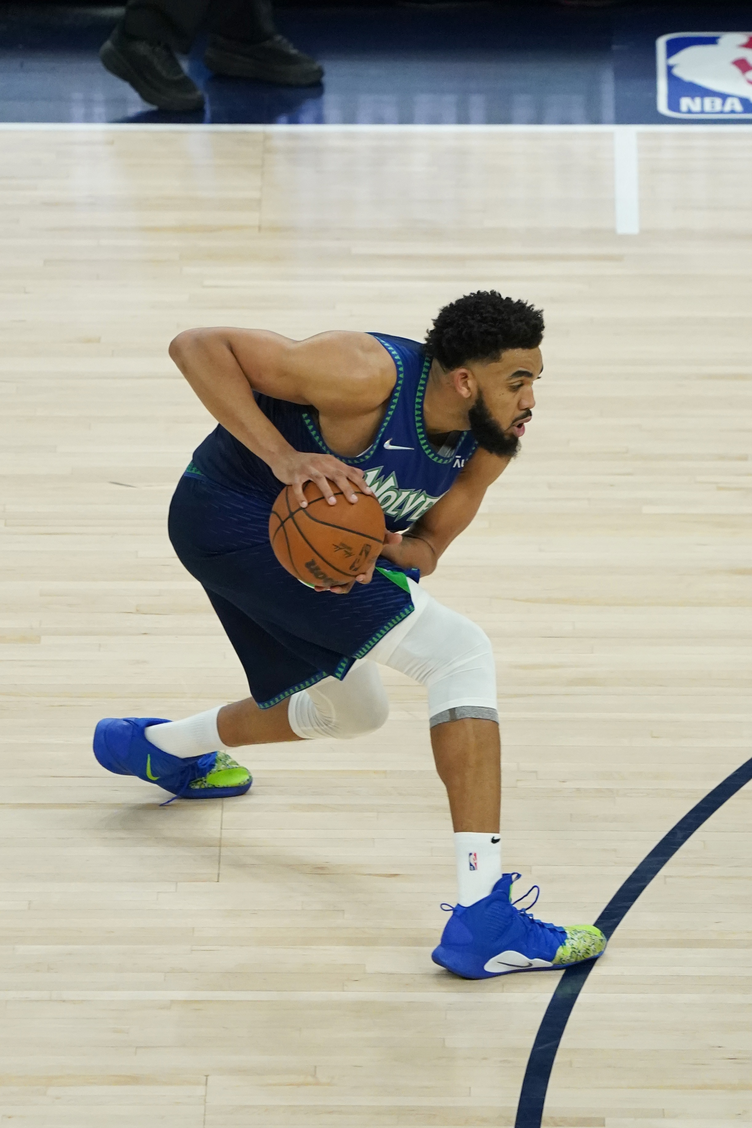 MINNEAPOLIS, MN -  APRIL 29:  Karl-Anthony Towns #32 of the Minnesota Timberwolves handles the ball against the Memphis Grizzlies during Round 1 Game 6 of the 2022 NBA Playoffs on April 29, 2022 at Target Center in Minneapolis, Minnesota. NOTE TO USER: User expressly acknowledges and agrees that, by downloading and or using this Photograph, user is consenting to the terms and conditions of the Getty Images License Agreement. Mandatory Copyright Notice: Copyright 2022 NBAE (Photo by Jordan Johnson/NBAE via Getty Images)