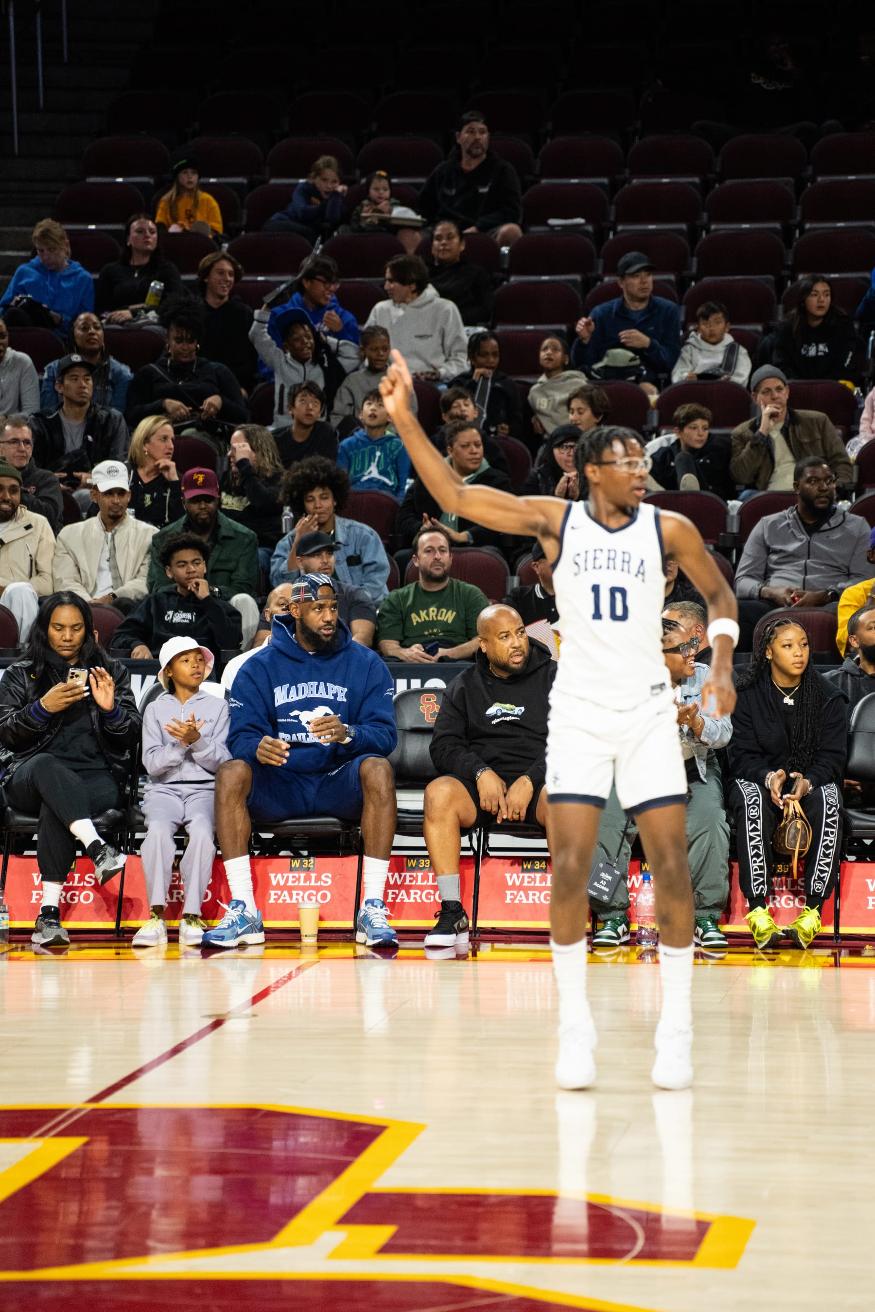 LOS ANGELES, CALIFORNIA - DECEMBER 16: Bryce James plays in front of his Dad LeBron James at The Chosen-1's Invitational at Galen Center on December 16, 2023 in Los Angeles, California. (Photo by Cassy Athena/Getty Images)